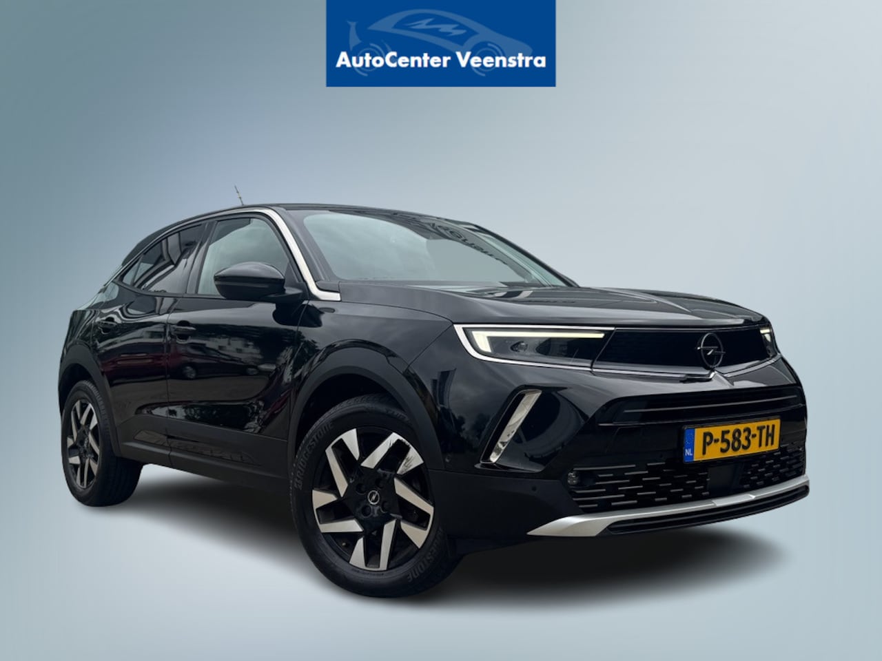 Opel Mokka - 1.2 Turbo BUSINESS ELEGANCE | LEER | CAMERA |TREKHAAK|CARPLAY | STOELVERW. | RIEM VERV. - AutoWereld.nl