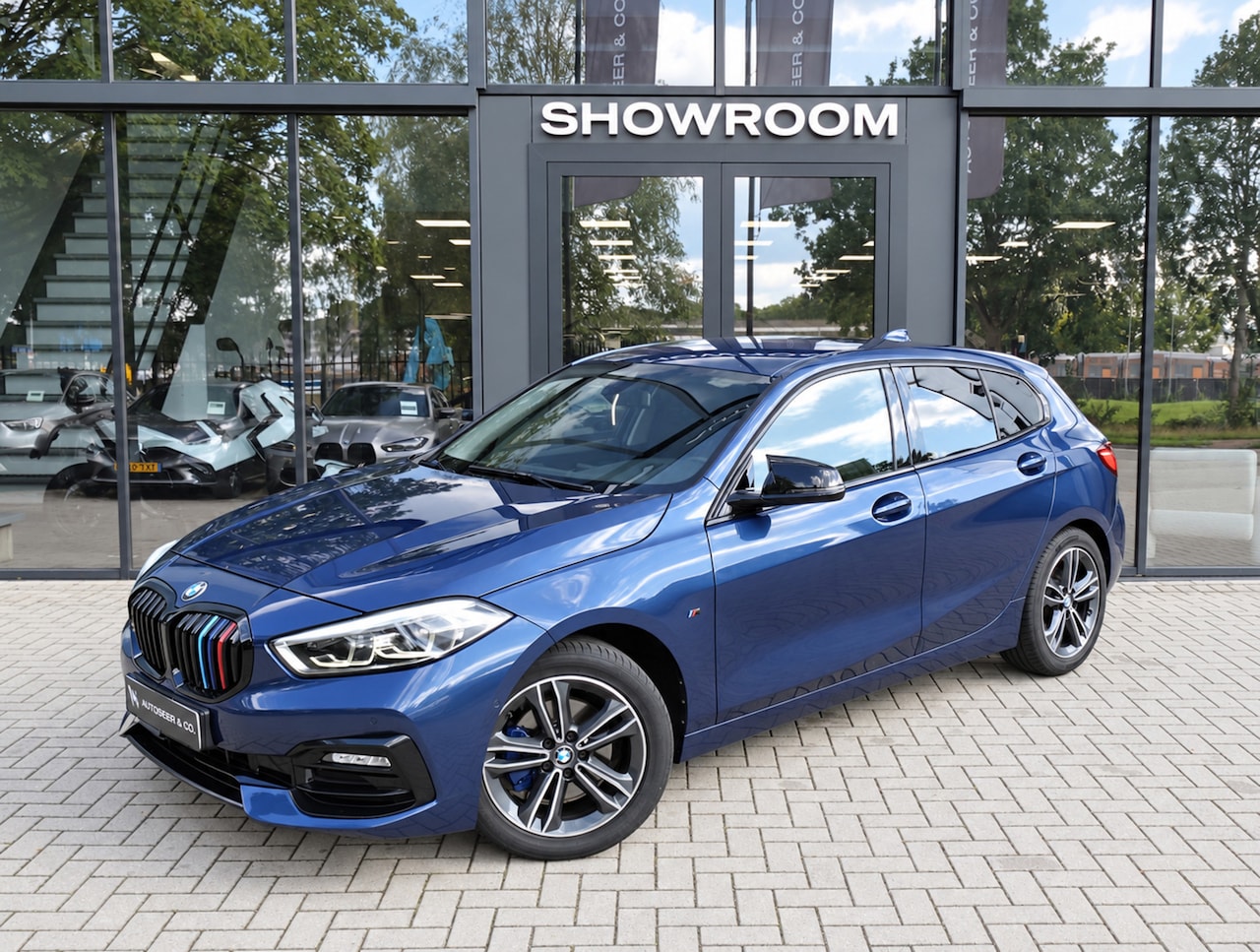 BMW 1-serie - 118i High Executive KEYLESS CAM LEDER VOL - AutoWereld.nl