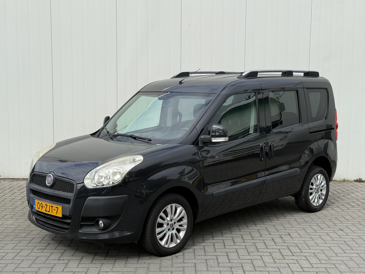 Fiat Doblò - 1.4 T-Jet 120pk Emotion Rolstoelauto 3+1 - Bodemverlaging - Luxe uitvoering - Rolstoelverv - AutoWereld.nl