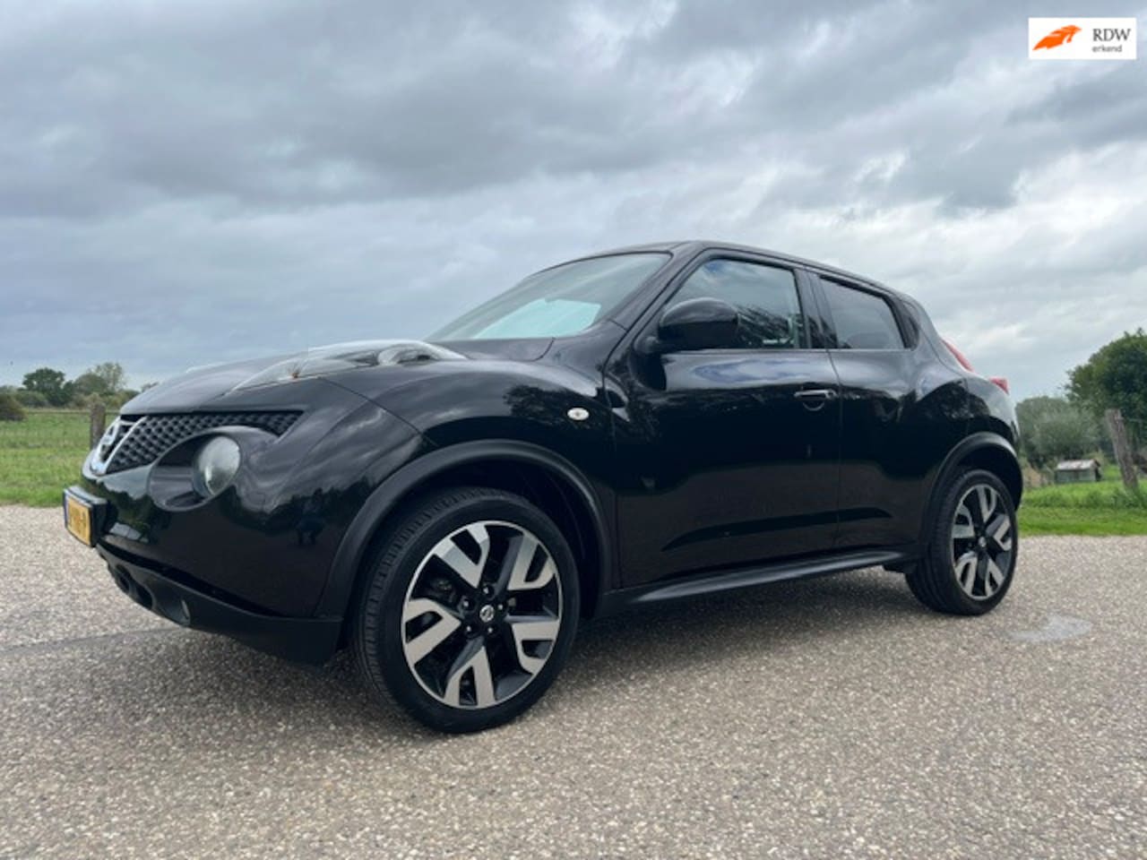 Nissan Juke - 1.6 Business Edition AUTOMAAT 5 drs 177318 km bj 2014 - AutoWereld.nl