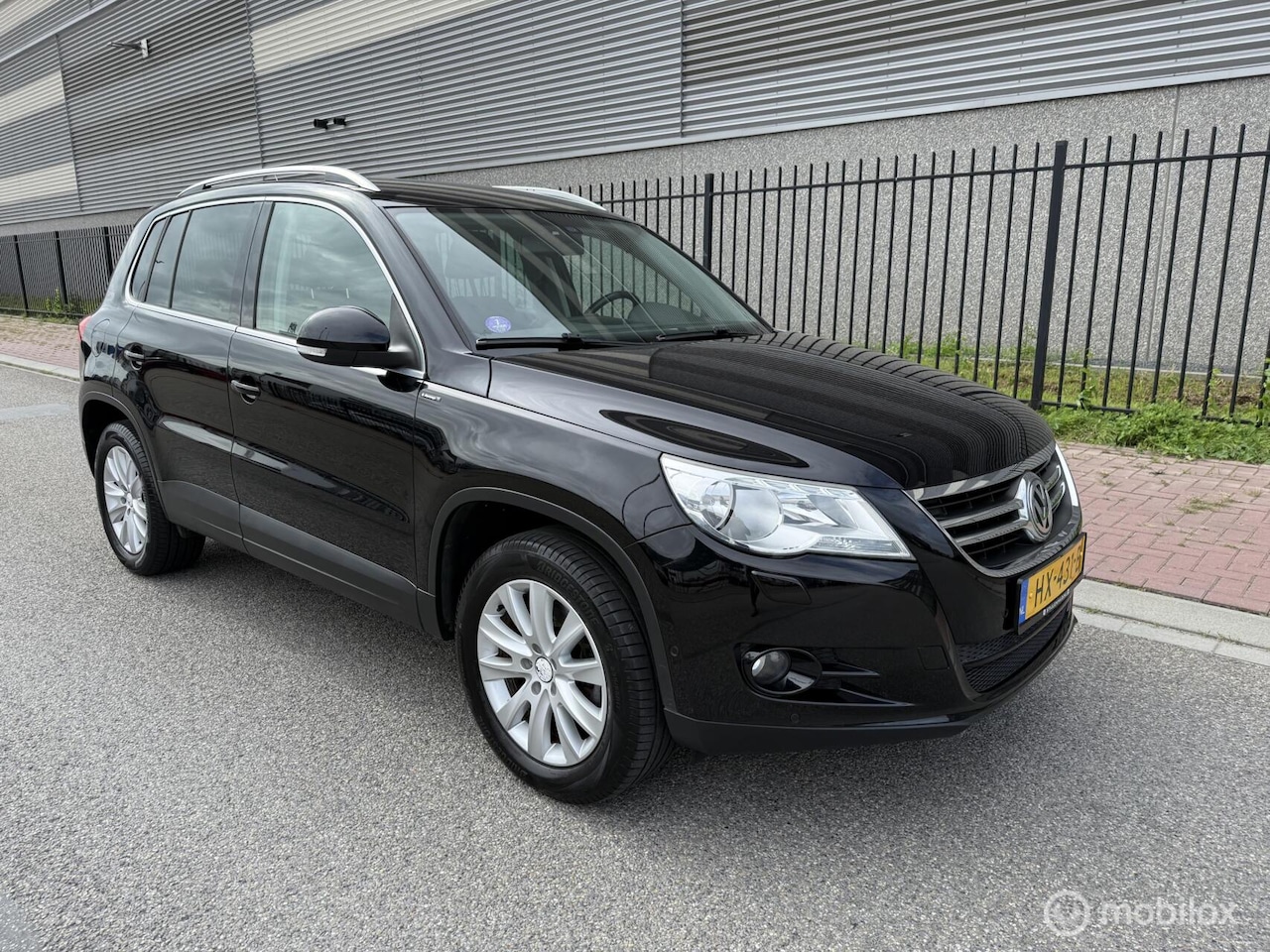 Volkswagen Tiguan - 1.4 TSI Sport&Style 1800 KG Trekgewicht - AutoWereld.nl