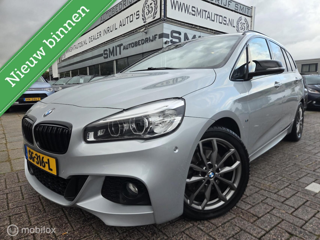 BMW 2-serie Gran Tourer - 218i CorporateL High Ex. Pano/Camera - AutoWereld.nl