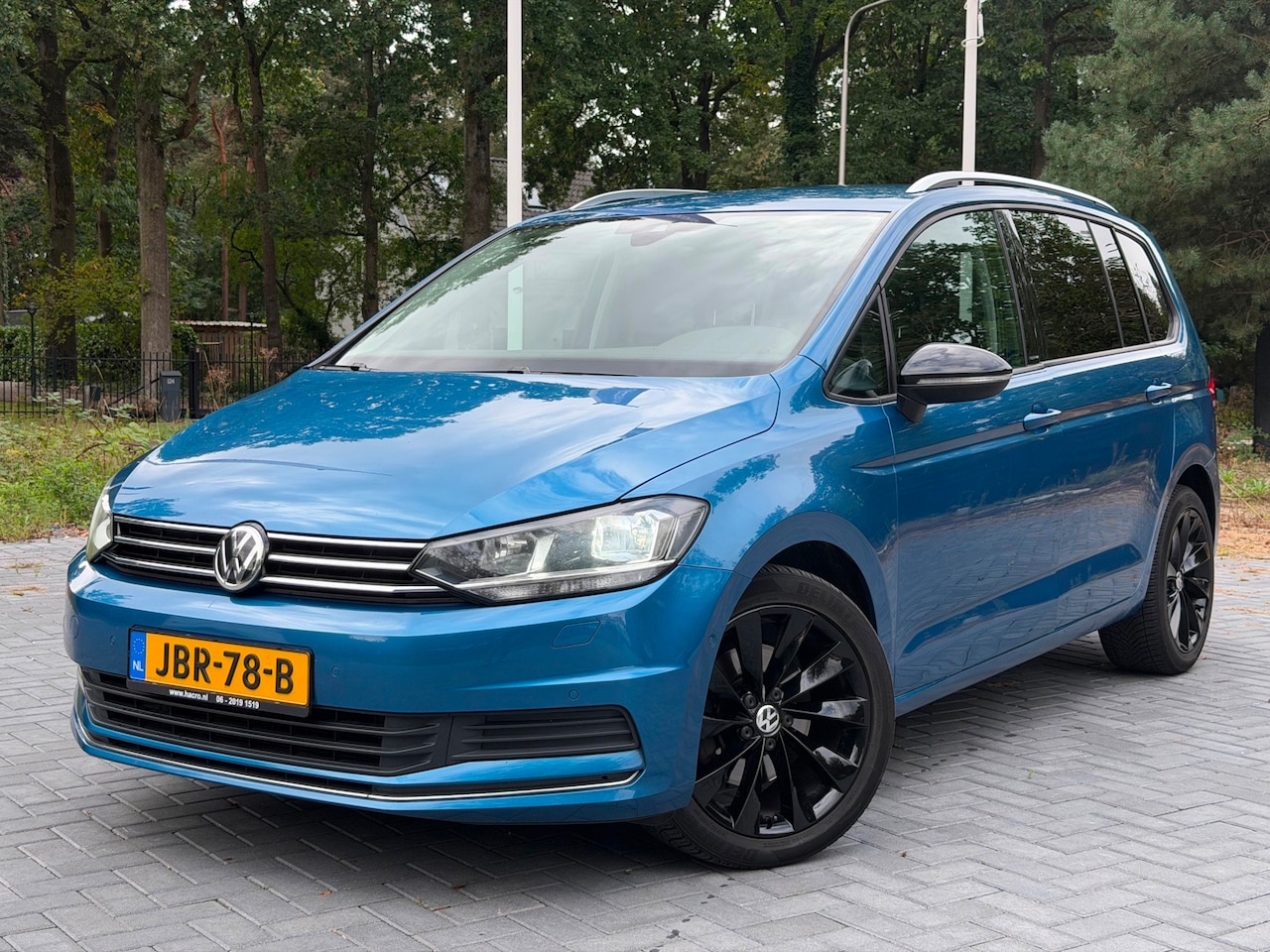 Volkswagen Touran - 2.0 TDI Highline 7p Automaat/Clima/Cruise/Camera/PDC/NAP - AutoWereld.nl