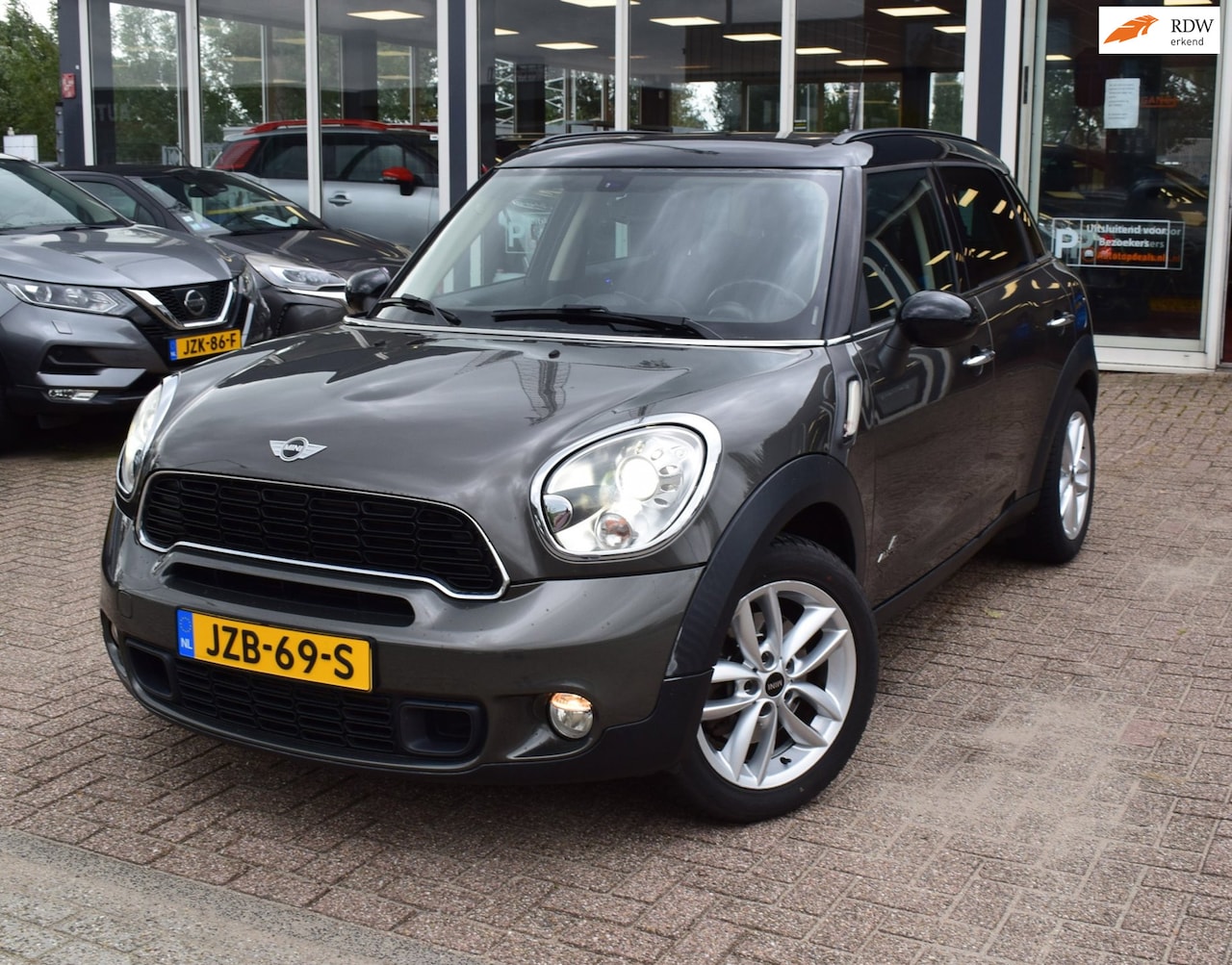 MINI Countryman - Mini 1.6 Cooper S ALL4 Salt PANORAMADAK | XENON | NAVI | HALF LEDER | CLIMATE CONTROL | AC - AutoWereld.nl