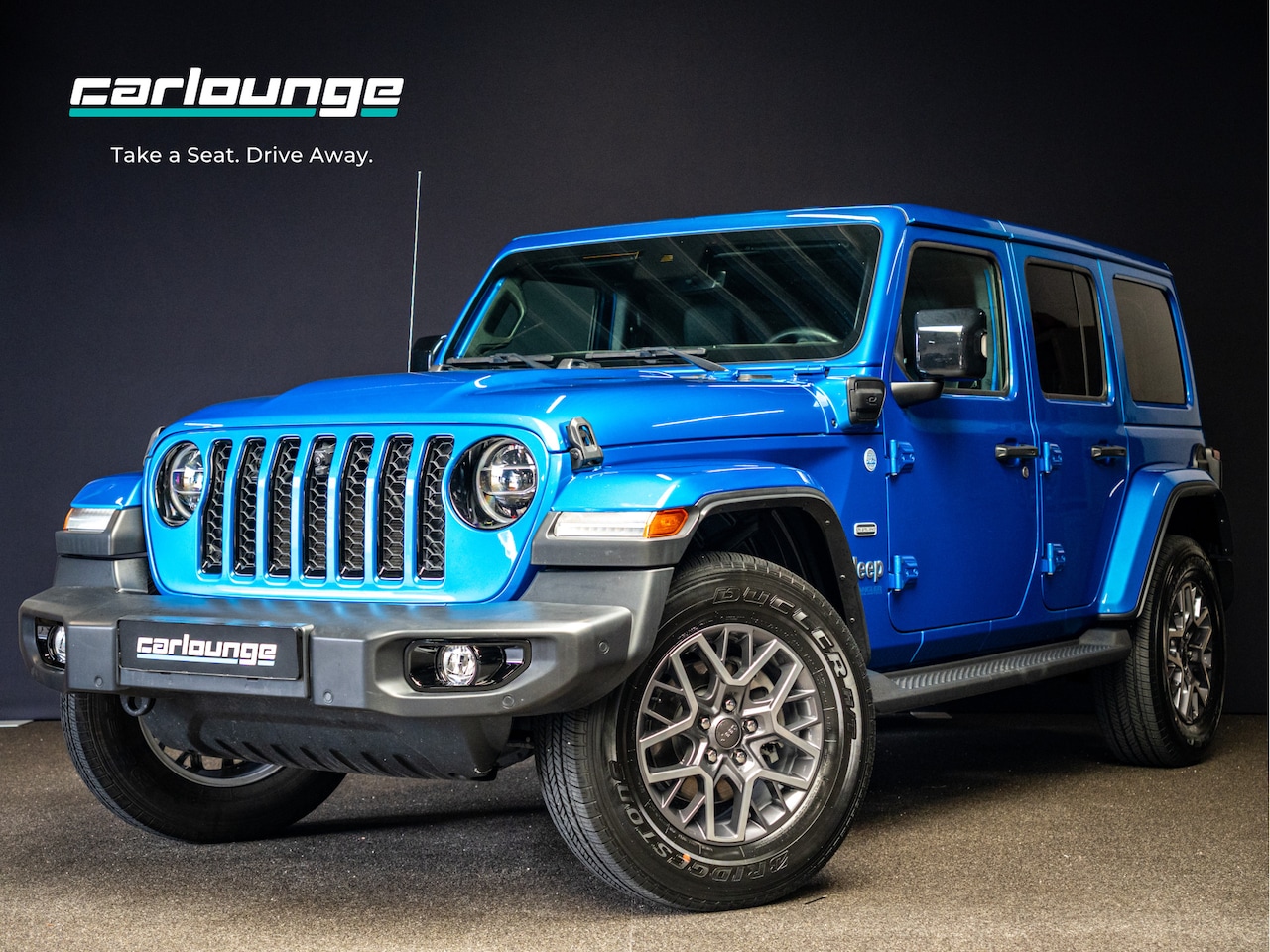 Jeep Wrangler Unlimited - 4xe 380 Sahara afneembaar dak|carplay|stuurverw|camera|keyless|BLIS|spiegelverw| - AutoWereld.nl