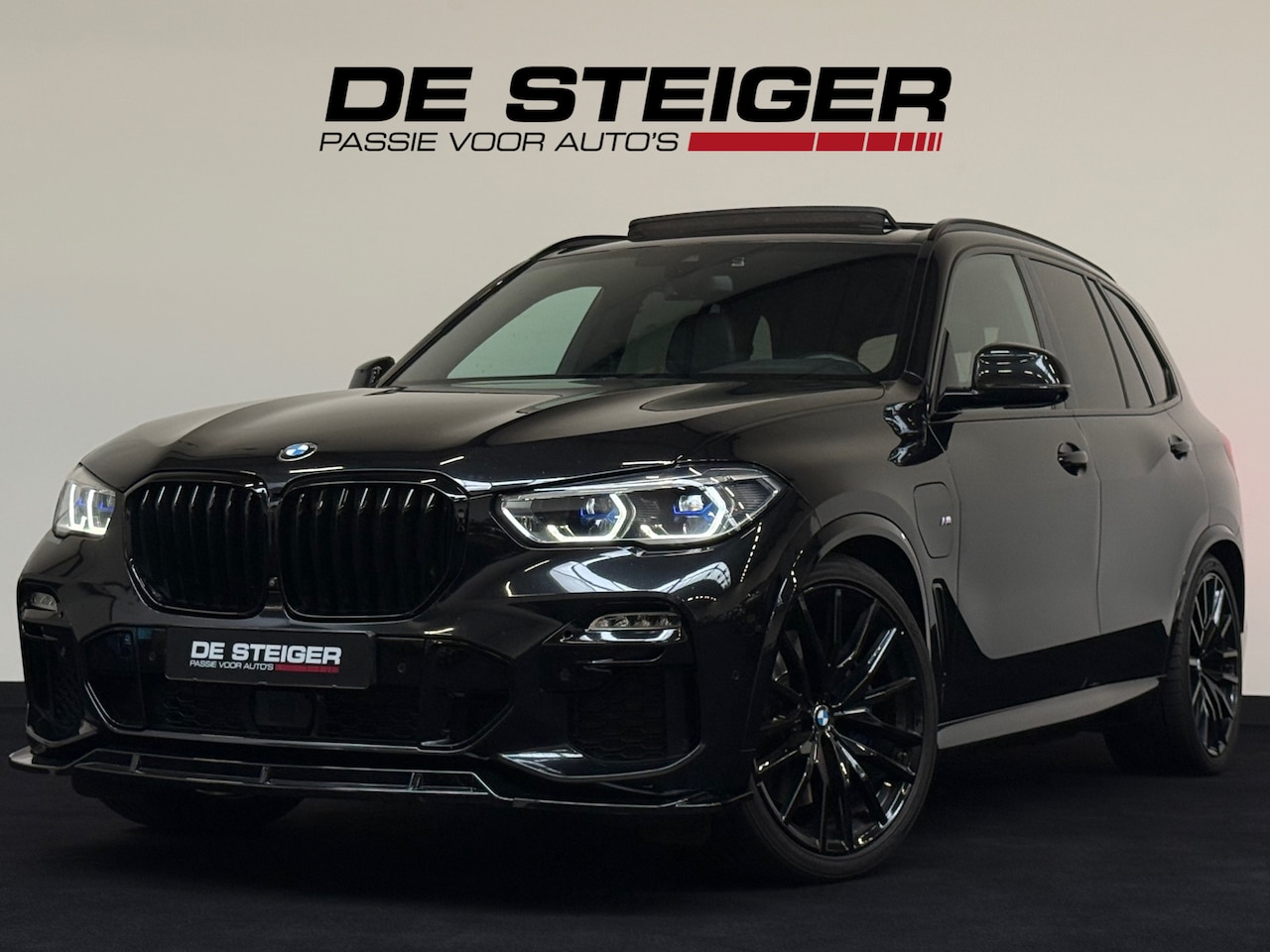 BMW X5 - XDrive45e High Executive M Sport Pano Laser 22 inch - AutoWereld.nl