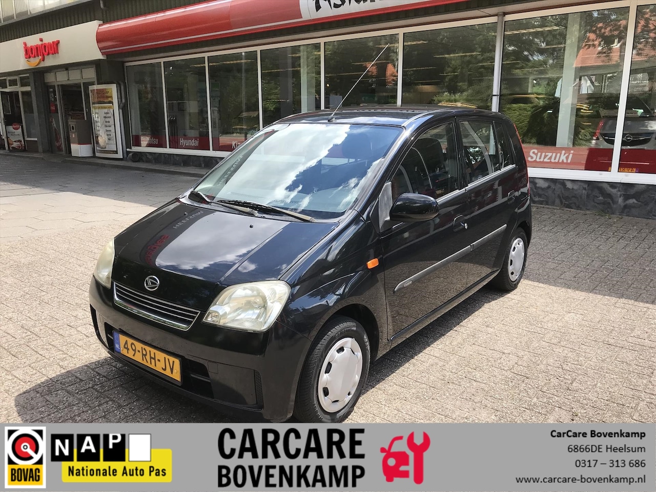 Daihatsu Cuore - 1.0 5D Tokio - AutoWereld.nl