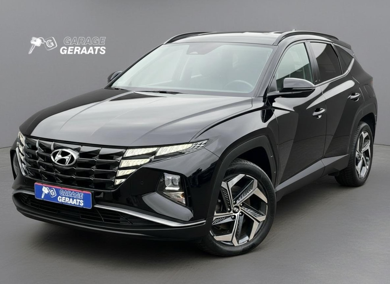 Hyundai Tucson - 1.6 T-GDI PHEV Comfort Smart 4WD |  Dealer onderhouden, 1e eigenaar, Parkeersensoren V+A e - AutoWereld.nl