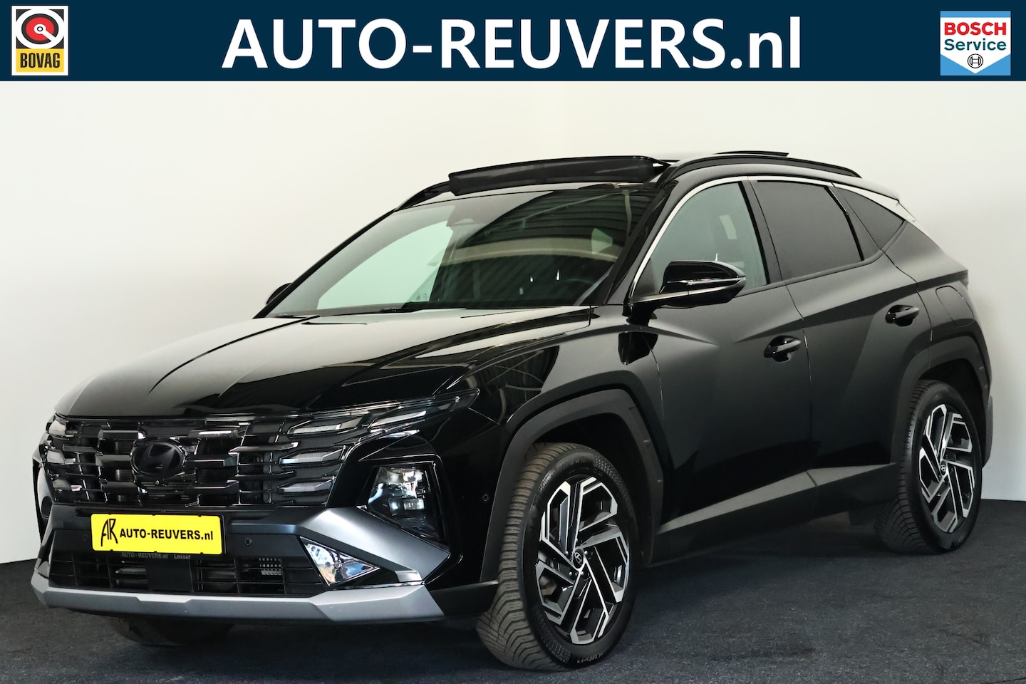 Hyundai Tucson - 1.6 T-GDI PHEV Premium Sky 4WD / Opendak / Leder / HUD / CarPlay - AutoWereld.nl