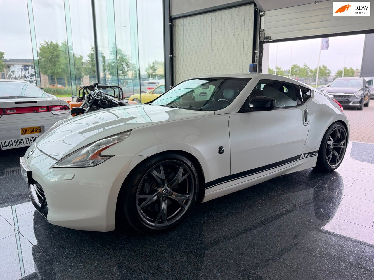 Nissan 370Z - 3.7 V6 GT Edition 328PK 2012 Milltek Automaat! - AutoWereld.nl