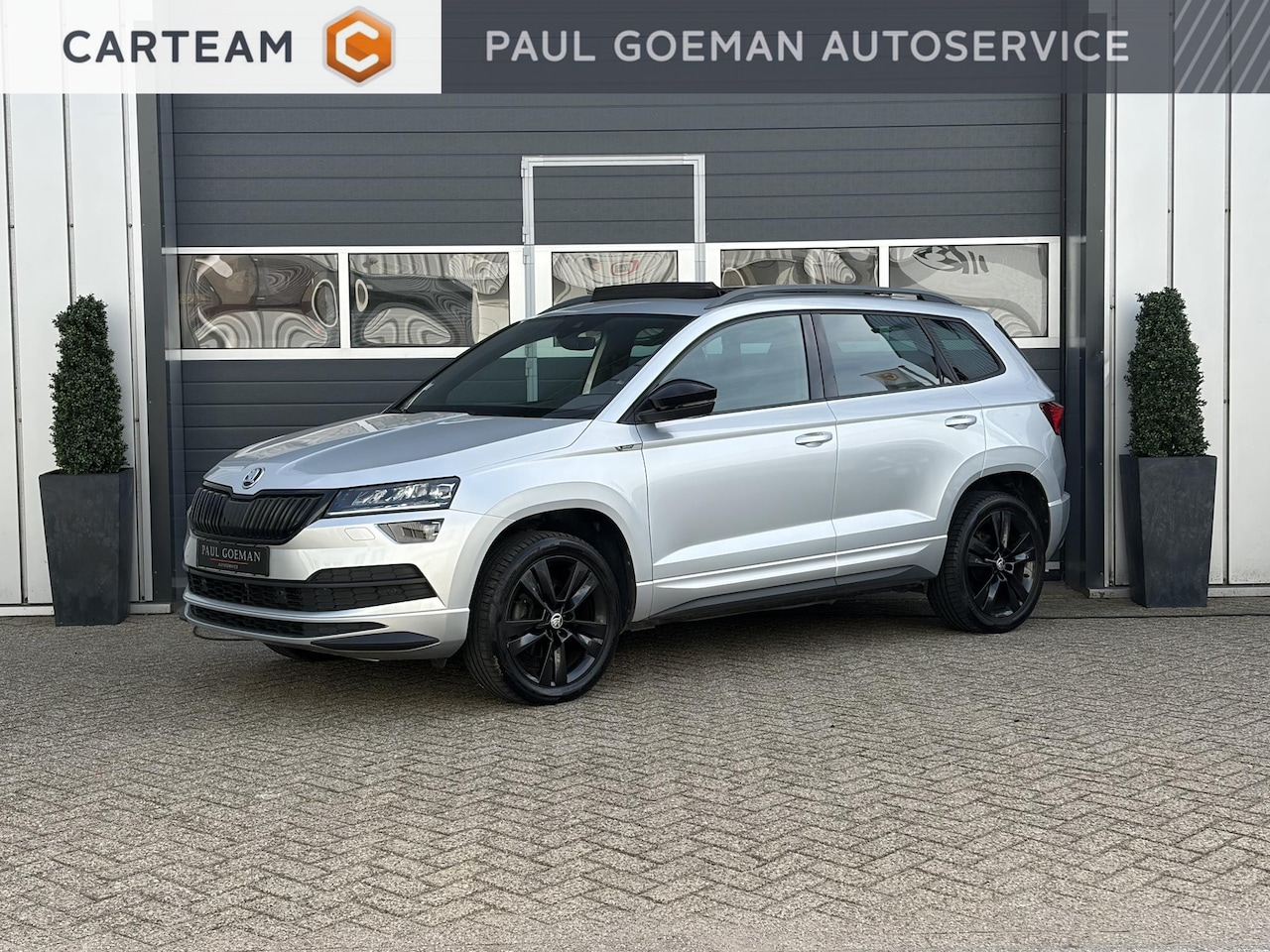 Skoda Karoq - 1.5 TSI ACT Sportline | Pano | Keyless | Parkeer sensoren | Elektrisch klep | - AutoWereld.nl