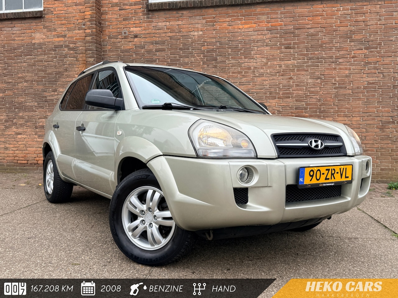 Hyundai Tucson - 2.0i Dynamic·Airco·Cruise·Trekhaak·Bluetooth·All season banden - AutoWereld.nl