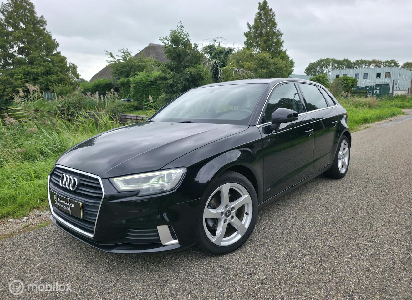 Audi A3 Sportback - 1.0 TFSI / Navi / PDC / Drive Select - AutoWereld.nl