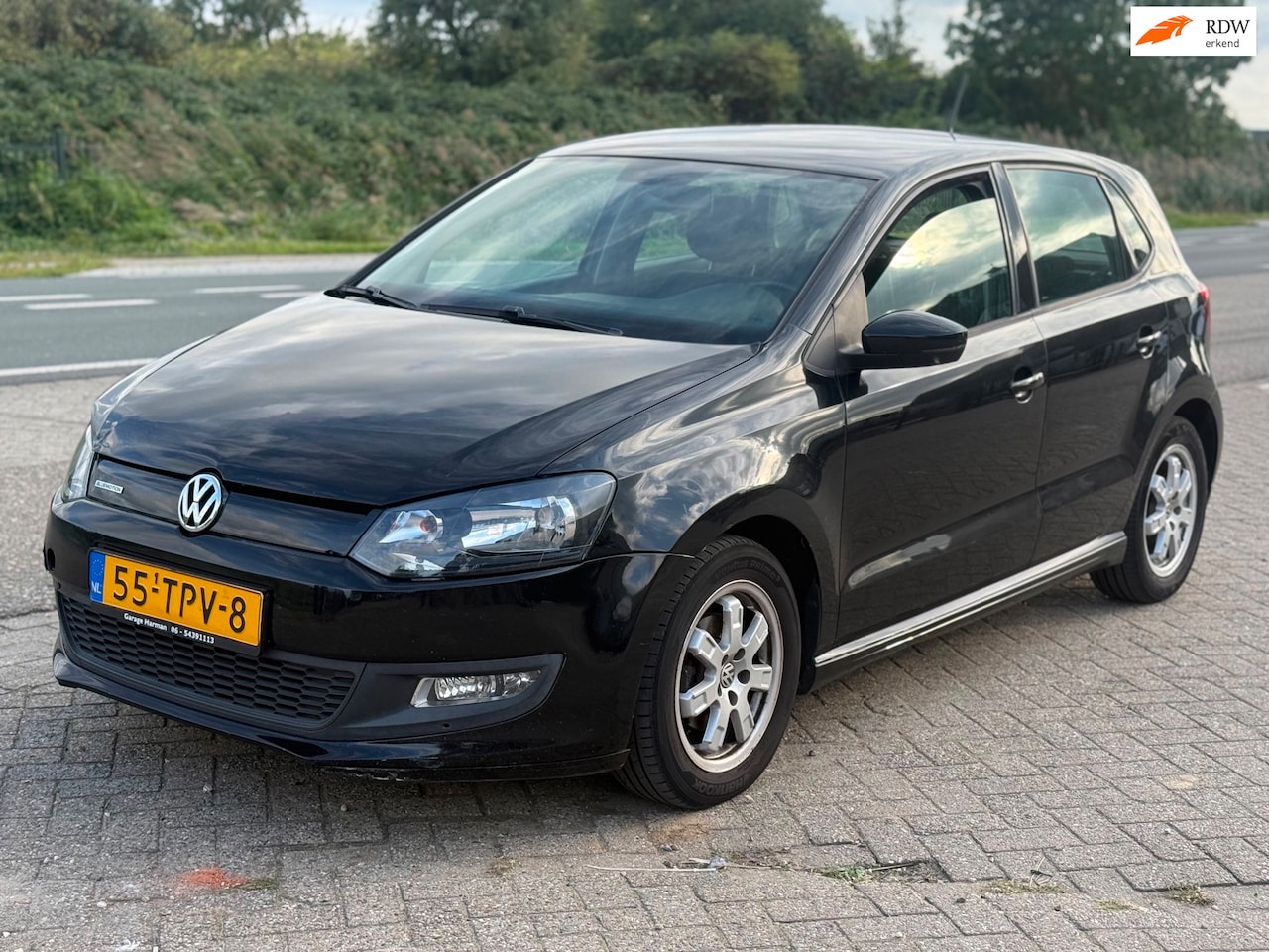 Volkswagen Polo - 1.2 TDI BlueMotion Bj 2012 Zwart 5Drs Airco - AutoWereld.nl