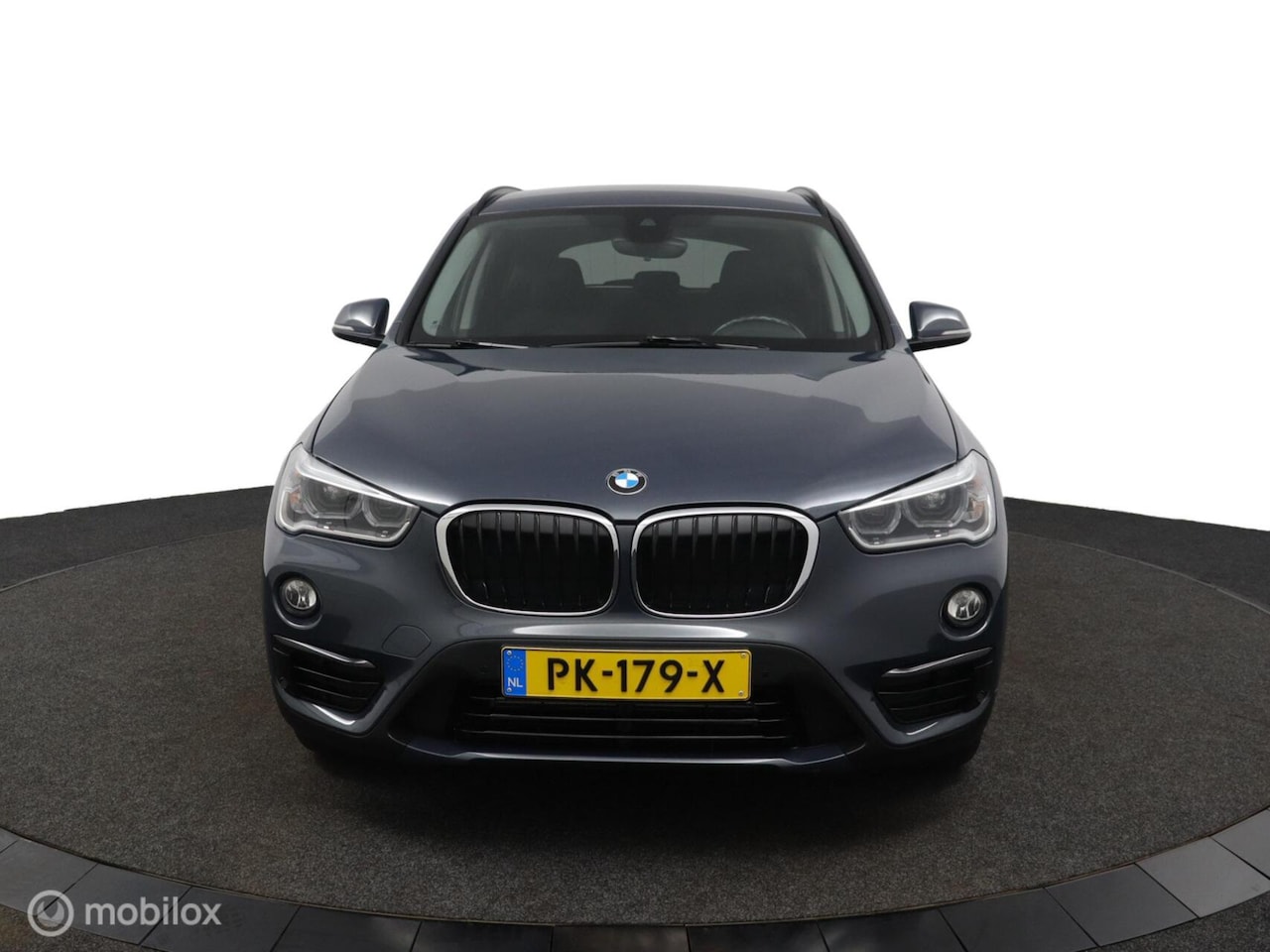BMW X1 - sDrive18i Exe CARPLAY TREKHAAK AIRCO NAVI CRUISE - AutoWereld.nl