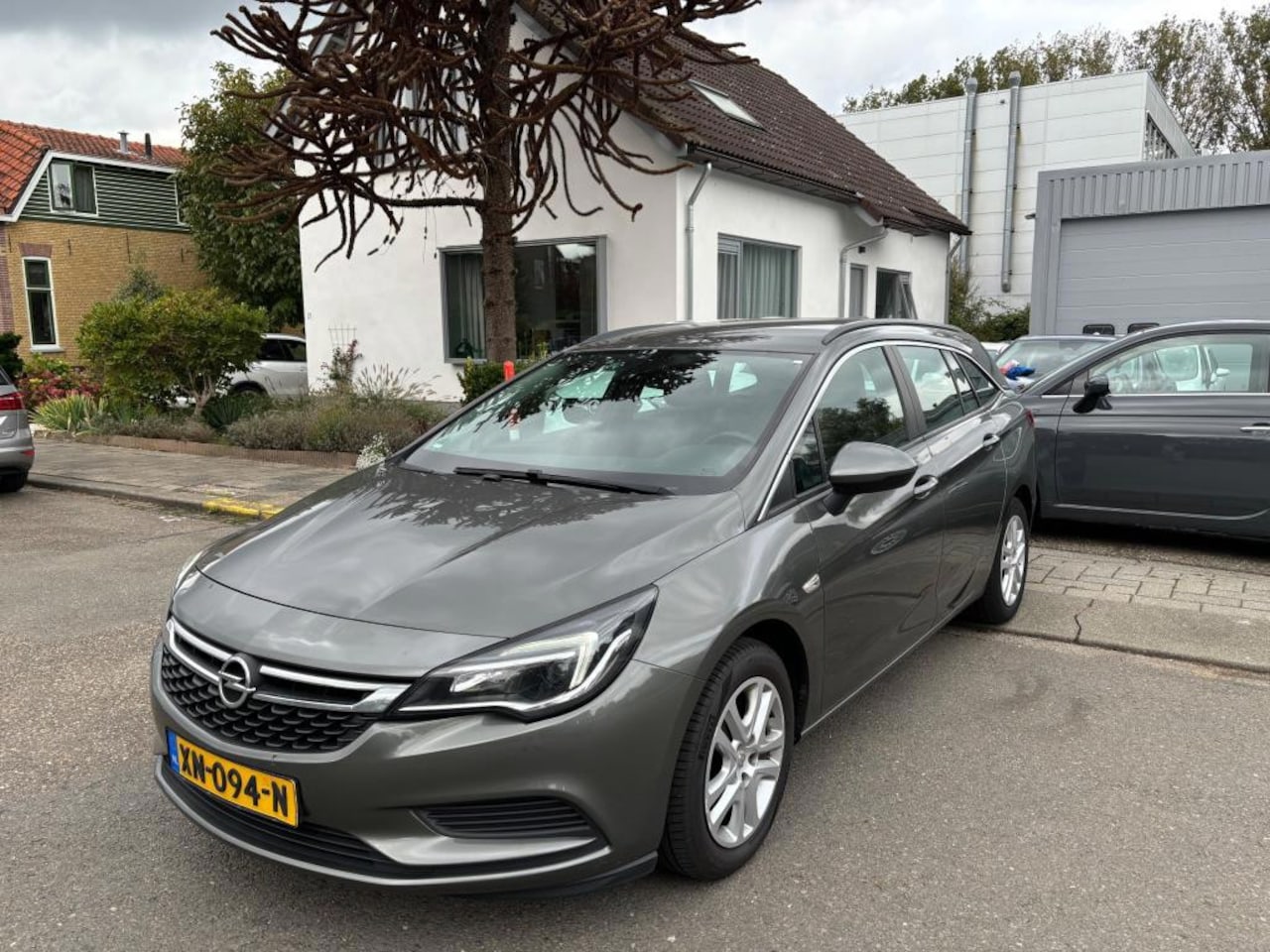 Opel Astra Sports Tourer - 1.0 Business+ 1.0 Business+ - AutoWereld.nl