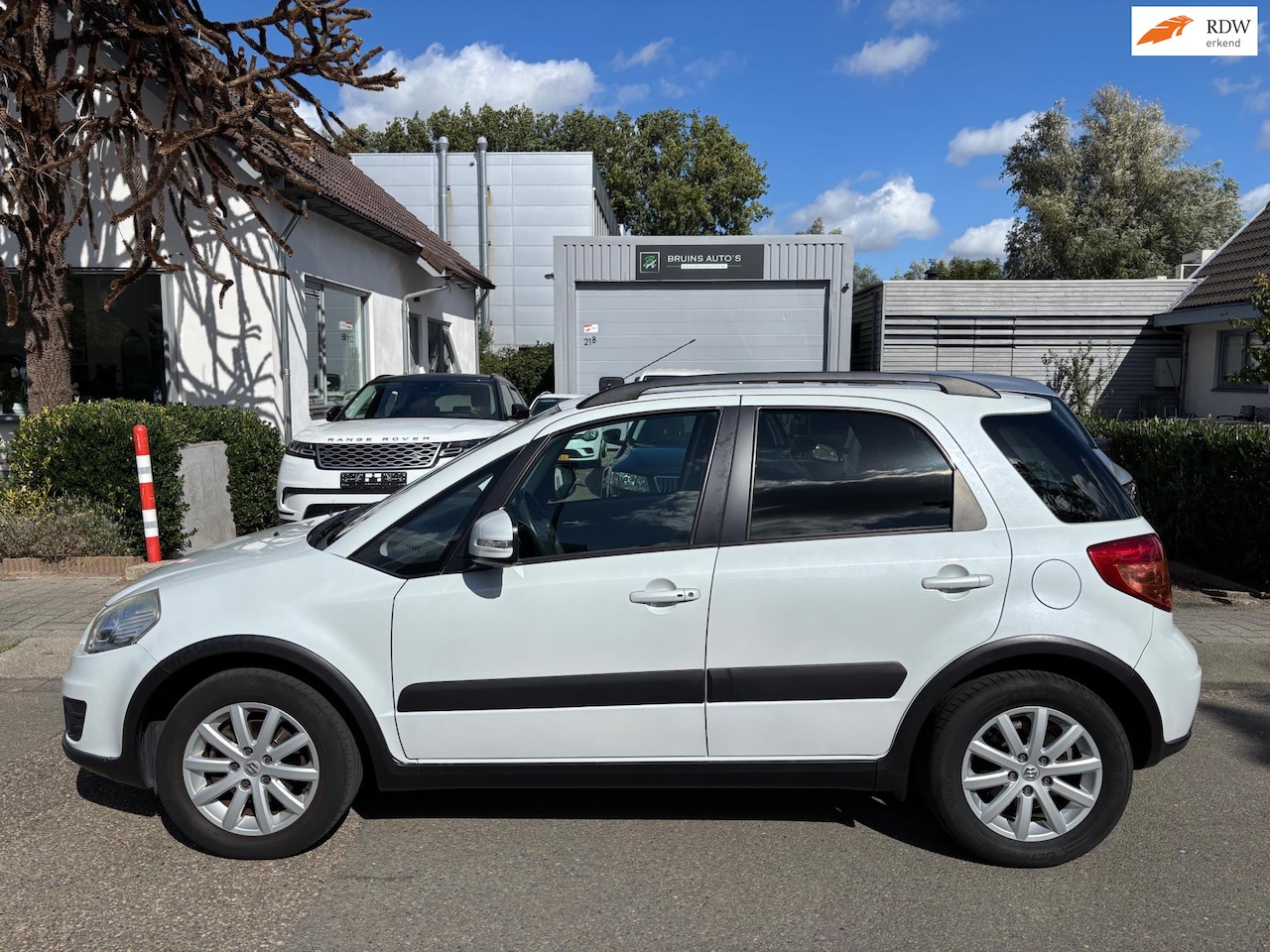 Suzuki SX4 - 1.6 Executive Navi Stoelverwarming Keyless - AutoWereld.nl