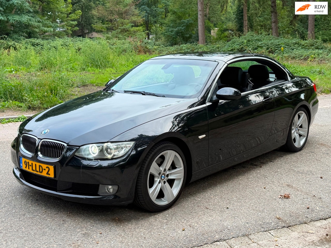 BMW 3-serie Cabrio - 325i 2009 Zwart Automaat - AutoWereld.nl
