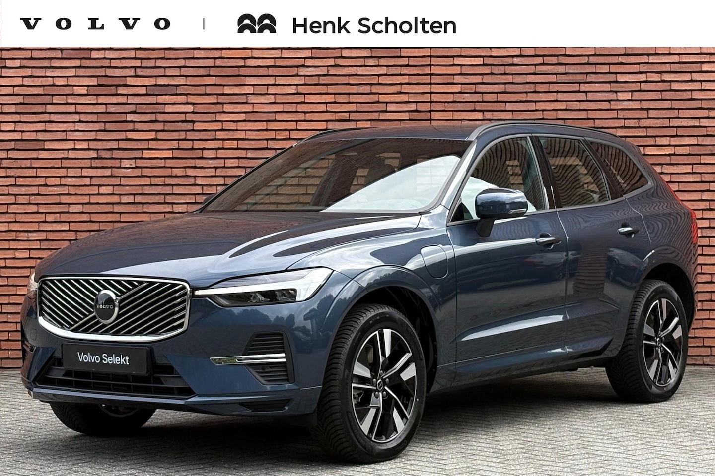 Volvo XC60 - 2.0 T6 Plug-in hybrid AWD Essential | Denim Blue metallic | Cardamom Nordico bekleding | 1 - AutoWereld.nl