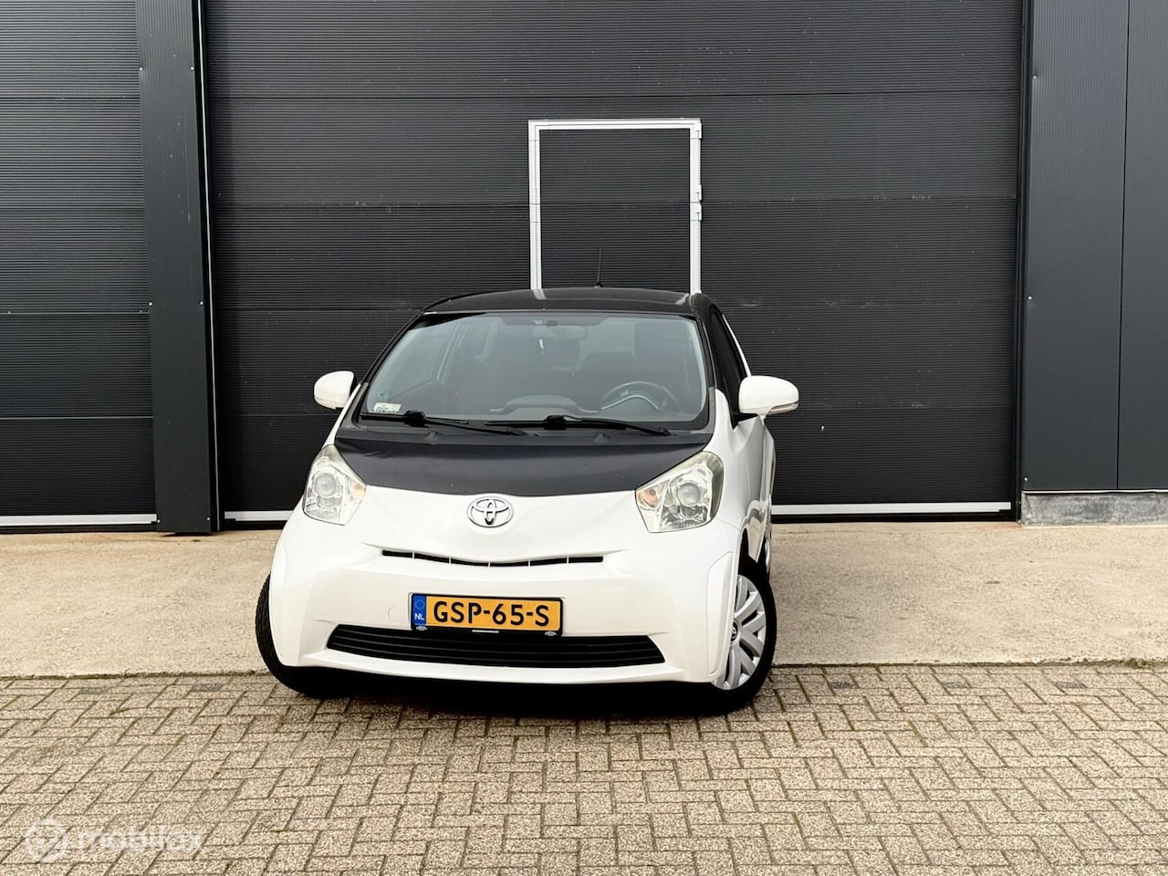 Toyota iQ - 1.0 2010 parelmoer wit APK 18/09/27 - AutoWereld.nl