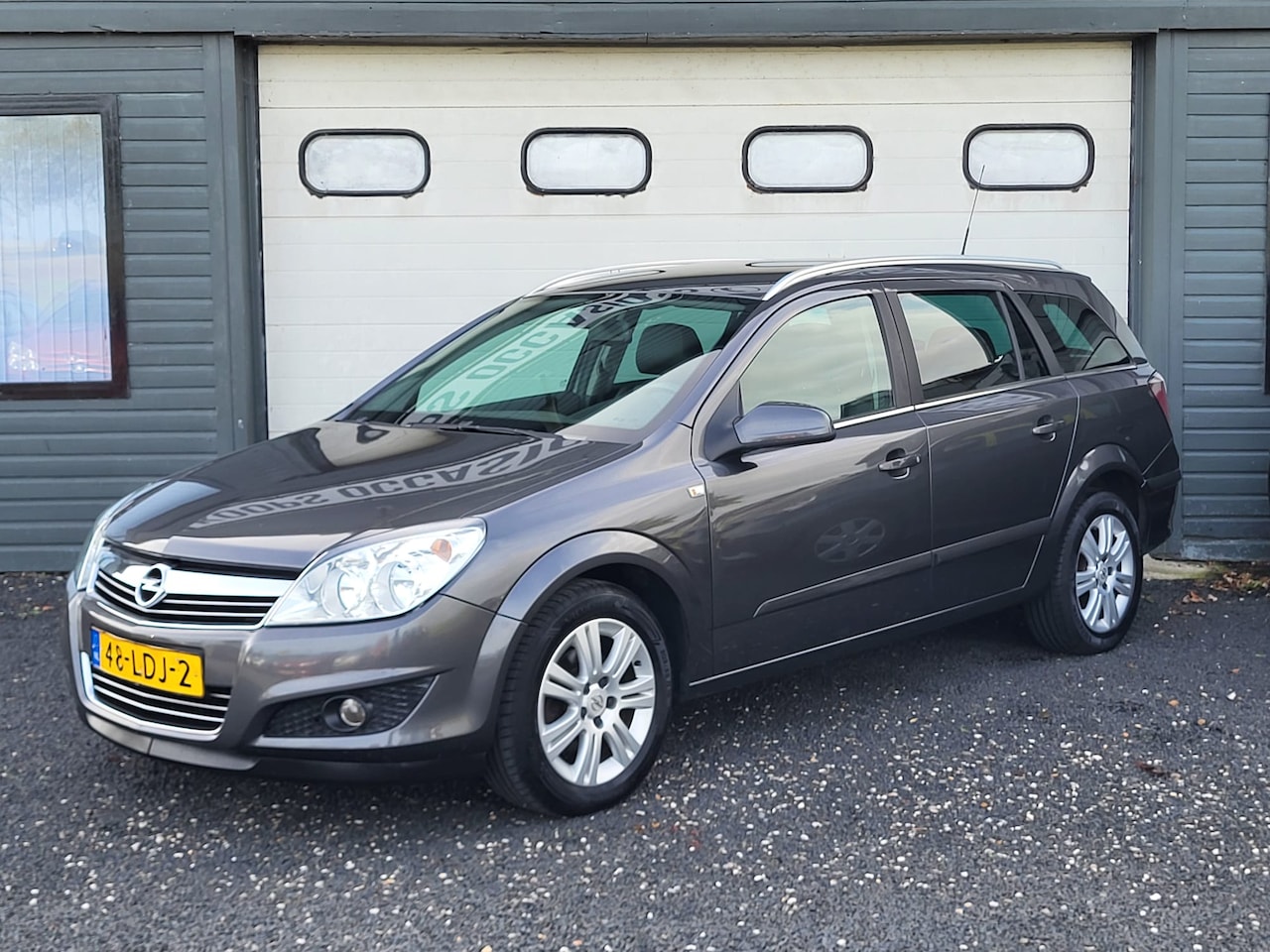 Opel Astra Wagon - 1.6 Cosmo | APK 5-2027 | Dealeronderhouden | Stoelverwarming | Leer | Trekhaak | Cruise Control - AutoWereld.nl