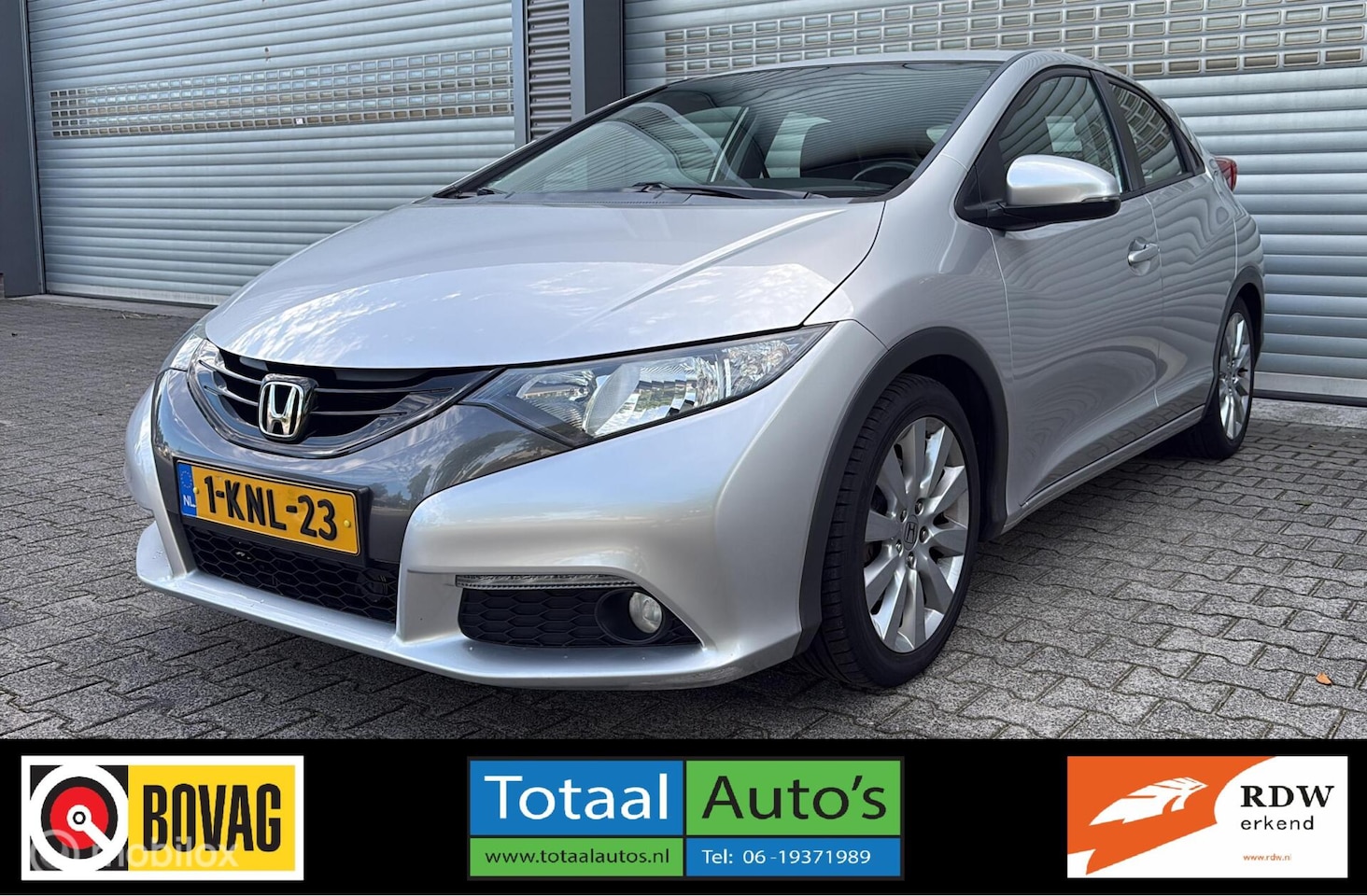 Honda Civic - 1.4 Sport*CRUISE*NAVI*CAMERA*TREKH*NEDERLANDS - AutoWereld.nl