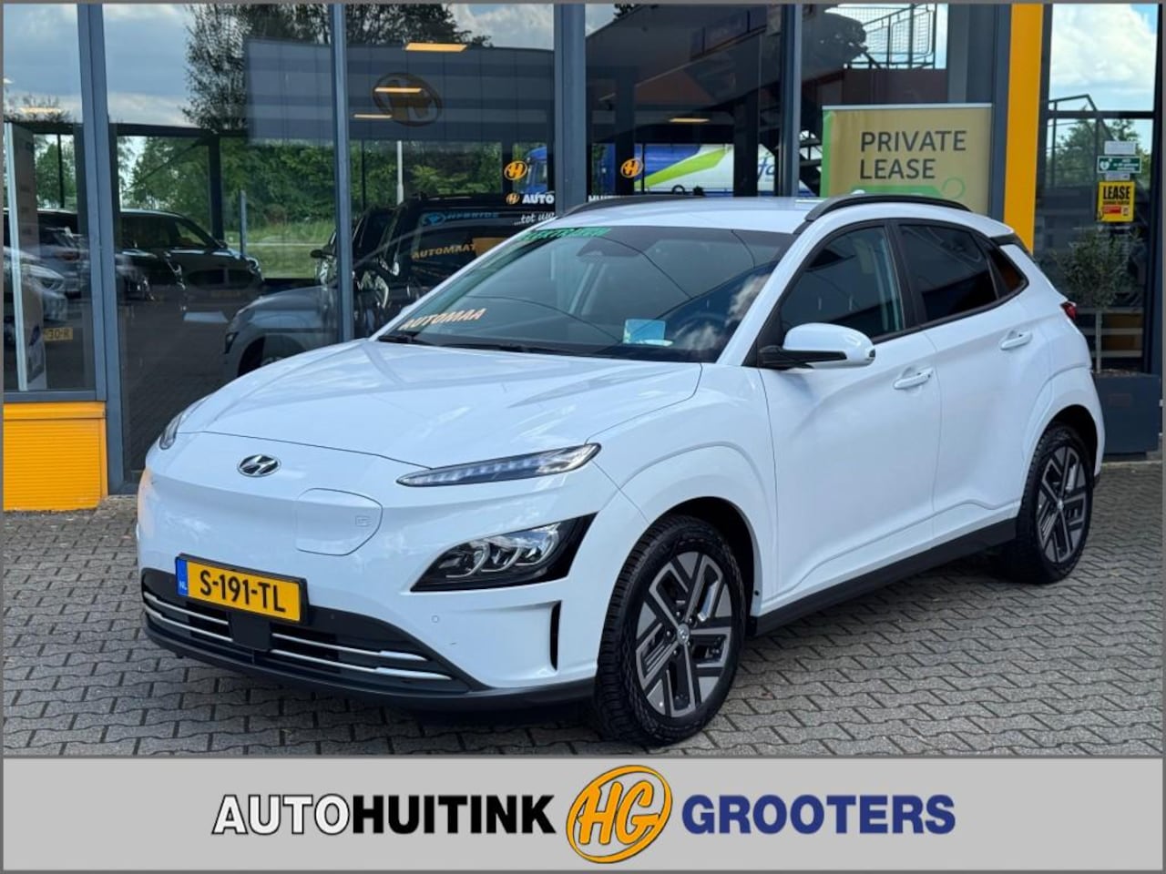 Hyundai Kona - EV 64kWh Premium - Navi - camera  - stoel/stuur verw. - head up - AutoWereld.nl