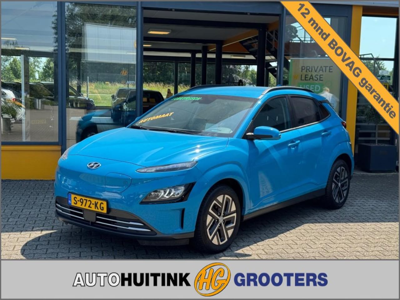 Hyundai Kona - EV 64kWh Premium - Navi - camera  - stoel/stuur verw. - head up - AutoWereld.nl
