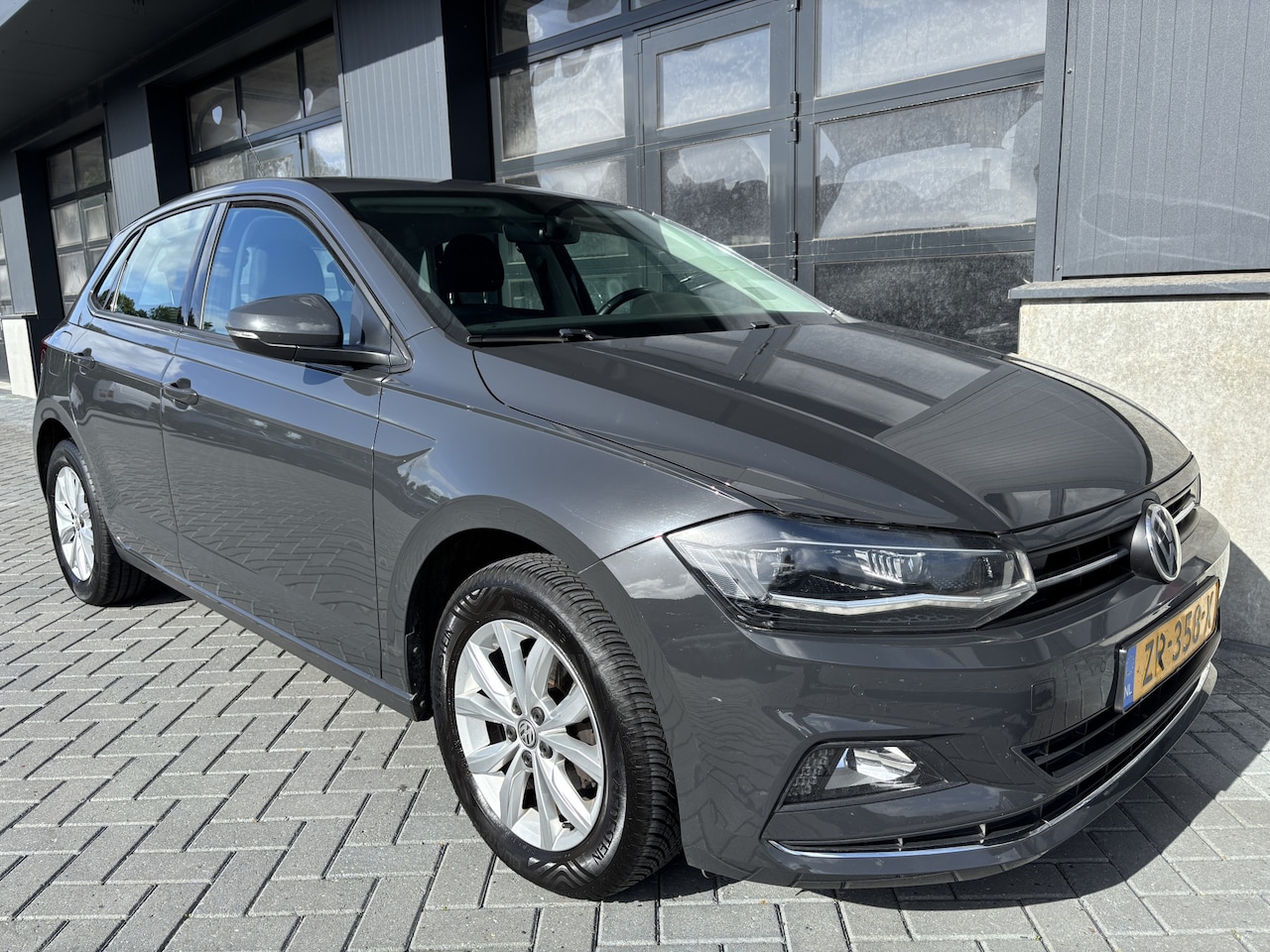 Volkswagen Polo - 1.0 TSI Comfortline stoelverwarming - AutoWereld.nl