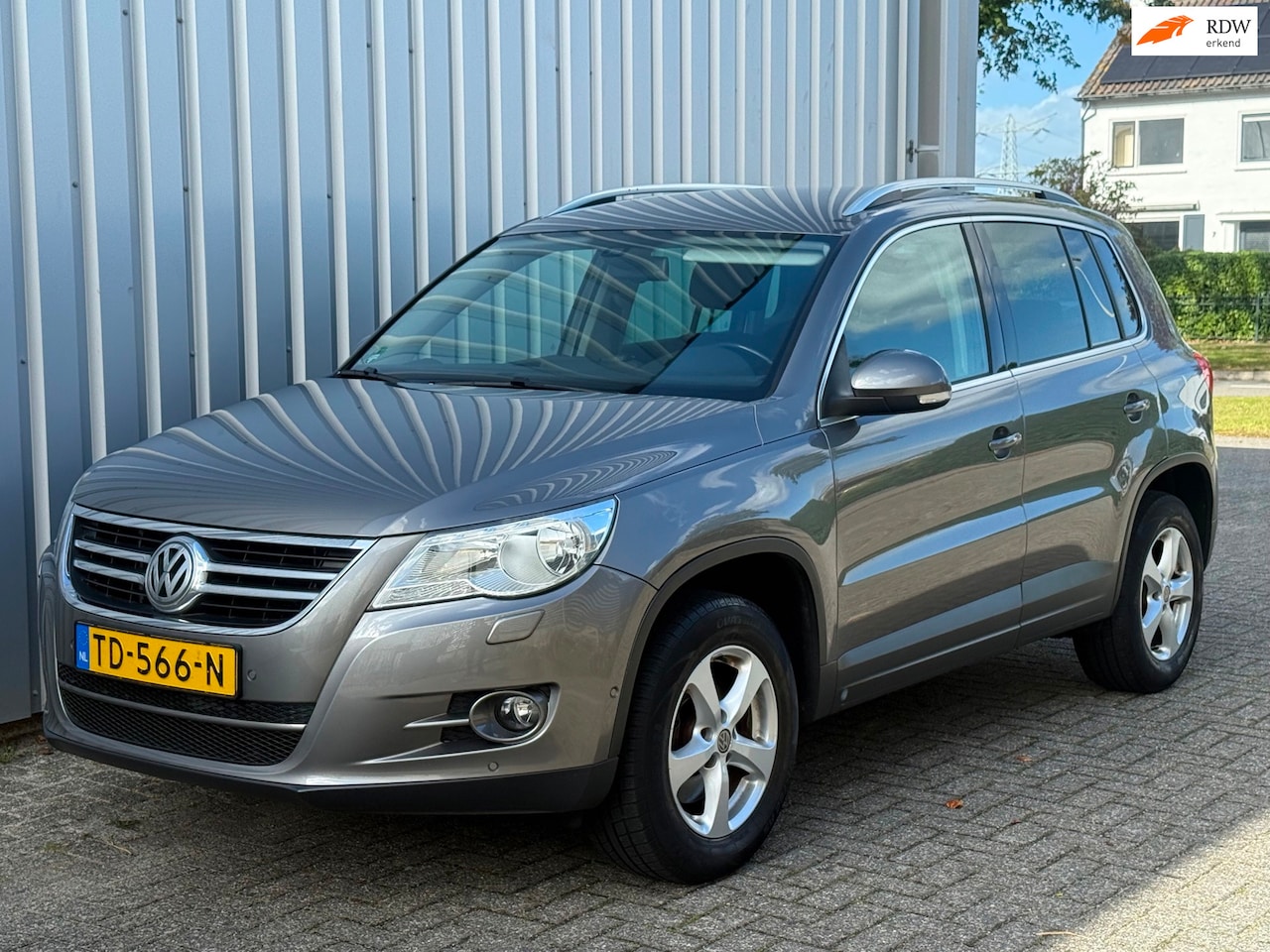 Volkswagen Tiguan - 2.0 TDI Sport&Style 4Motion / DSG Nette auto - AutoWereld.nl