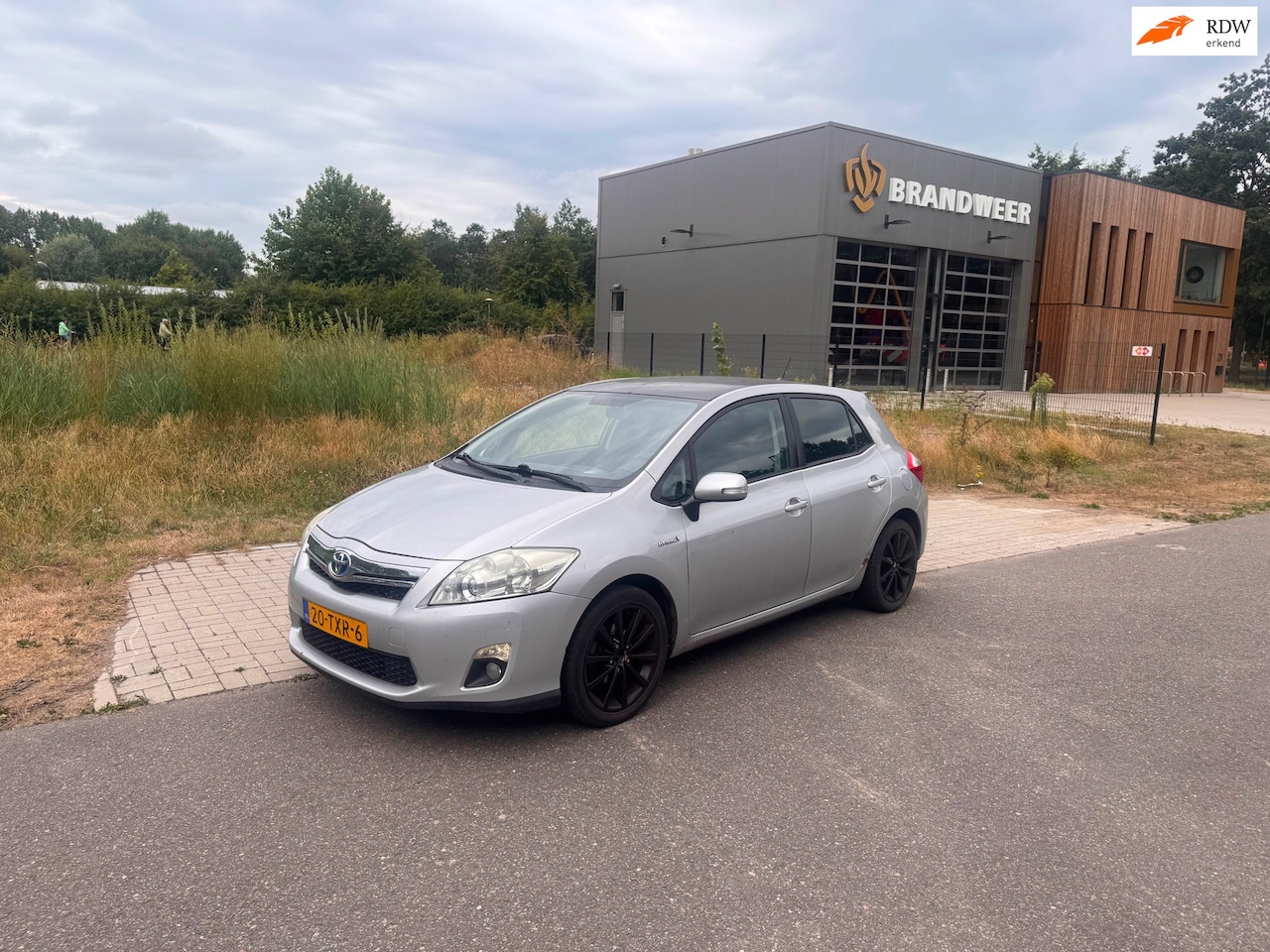 Toyota Auris - 1.8 Full Hybrid Aspiration Clima.Navi - AutoWereld.nl