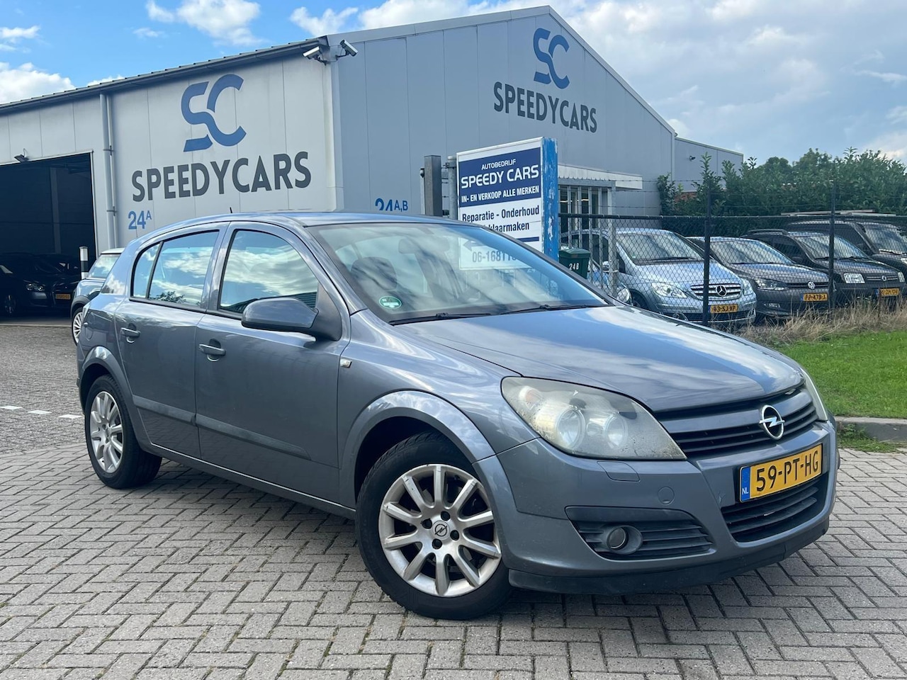 Opel Astra - 1.6 Cosmo 5DRS Cruise Airco Elektr Ramen - AutoWereld.nl