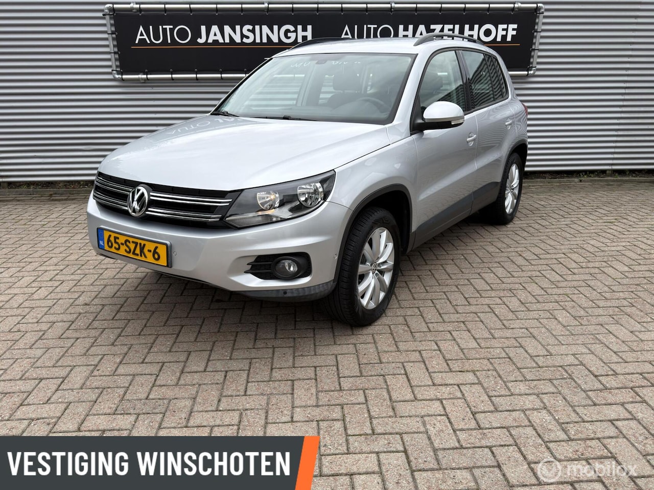 Volkswagen Tiguan - 1.4 TSI Sport&Style 4Motion! | Navi | Cruise | PDC V+A | - AutoWereld.nl