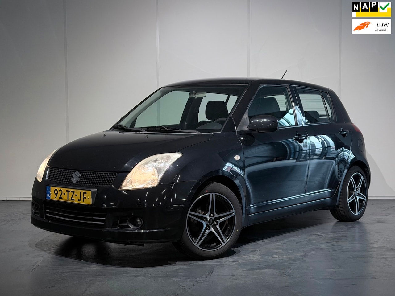 Suzuki Swift - 1.3 Shogun /Airco/Elek. Pakket/LMV/NAP - AutoWereld.nl