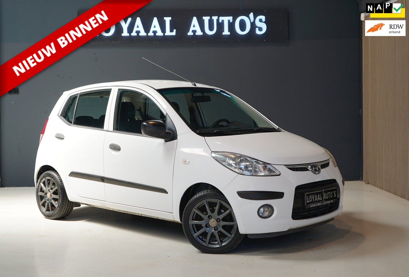 Hyundai i10 - 1.1 Active Orange Babies | AIRCO | PDC | ELEK.RAMEN | APK | NAP. - AutoWereld.nl