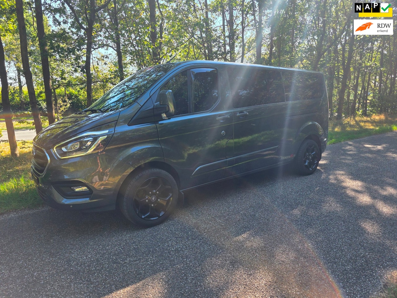 Ford Transit Custom - 320 2.0 TDCI L2H1 Limited DC 320 2.0 TDCI L2H1 Limited DC 1st Eigenaar - AutoWereld.nl