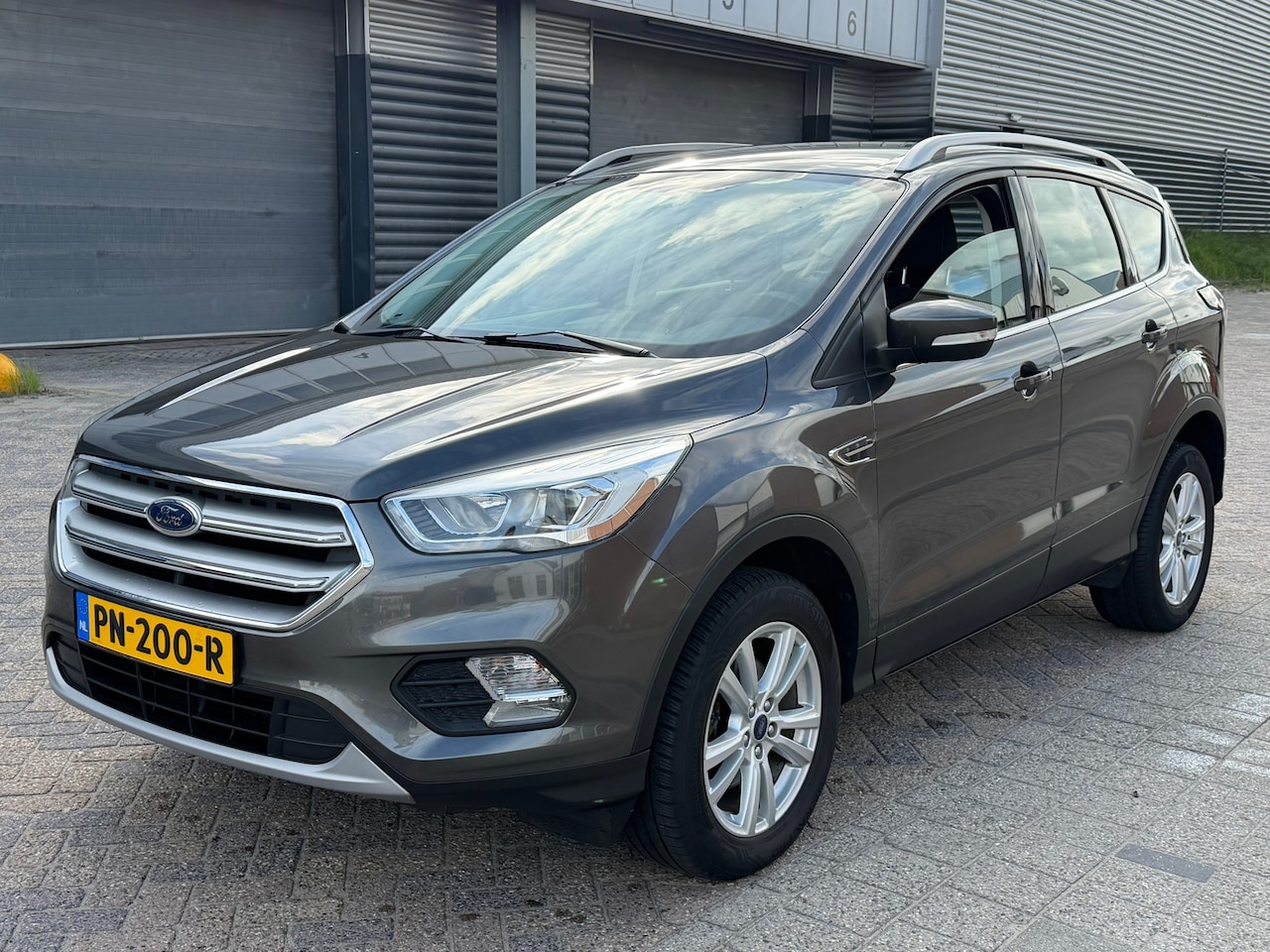 Ford Kuga - 1.5 EcoBoost Trend Ultimate LEES TEKST - AutoWereld.nl