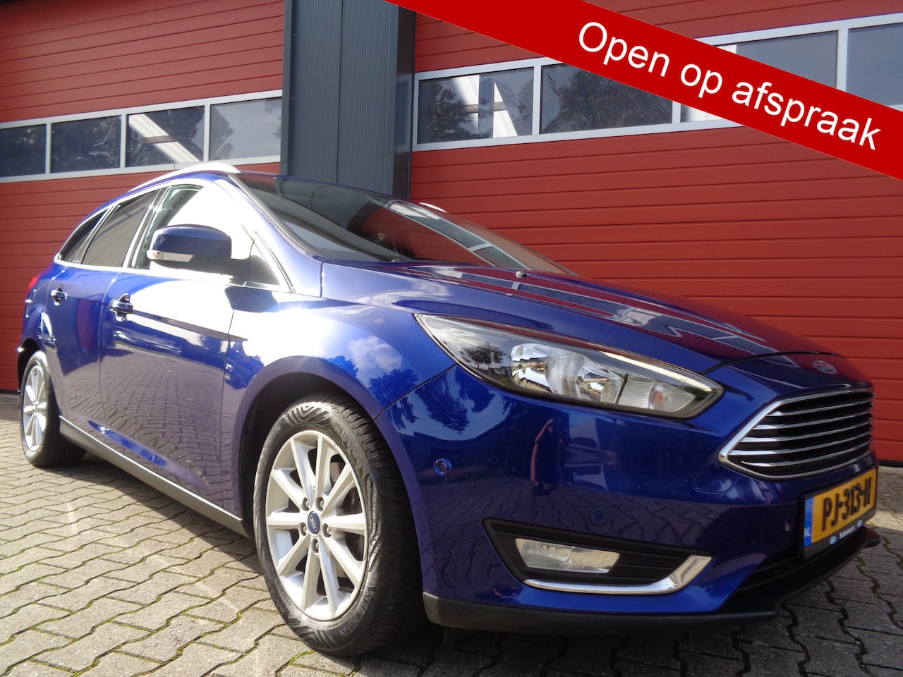 Ford Focus Wagon - 1.0 Titanium 126PK Clima Cruise LMV 6-BAK Trekhaak - AutoWereld.nl