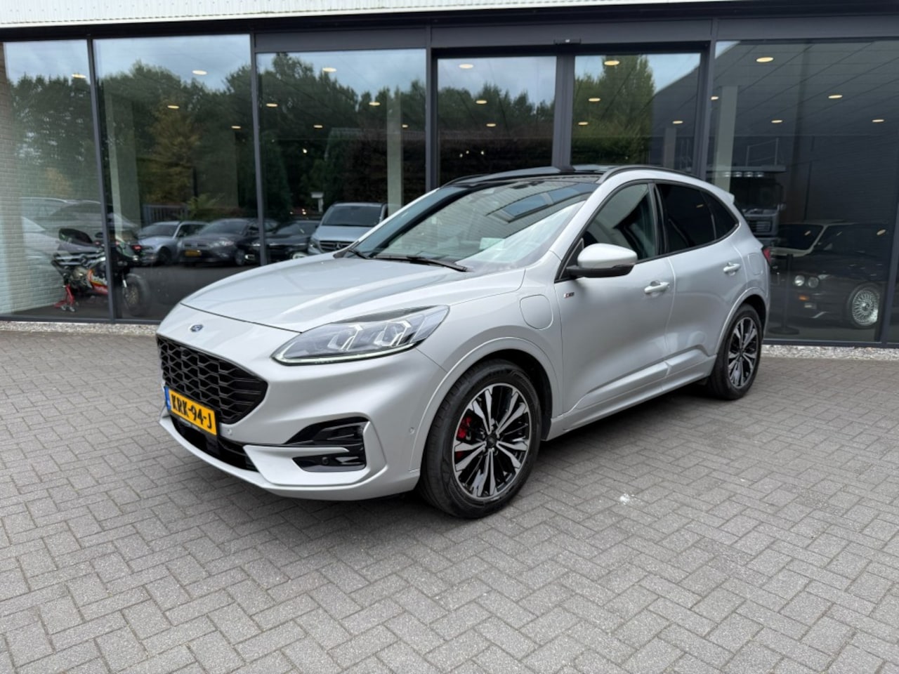 Ford Kuga - 2.5 PHEV ST-Line X 2.5 PHEV ST-LINE X,Pano/Schuifdak,Keyless,Driving Ass.,LED,Winterpack,Trekhk Elekt,B/O - AutoWereld.nl