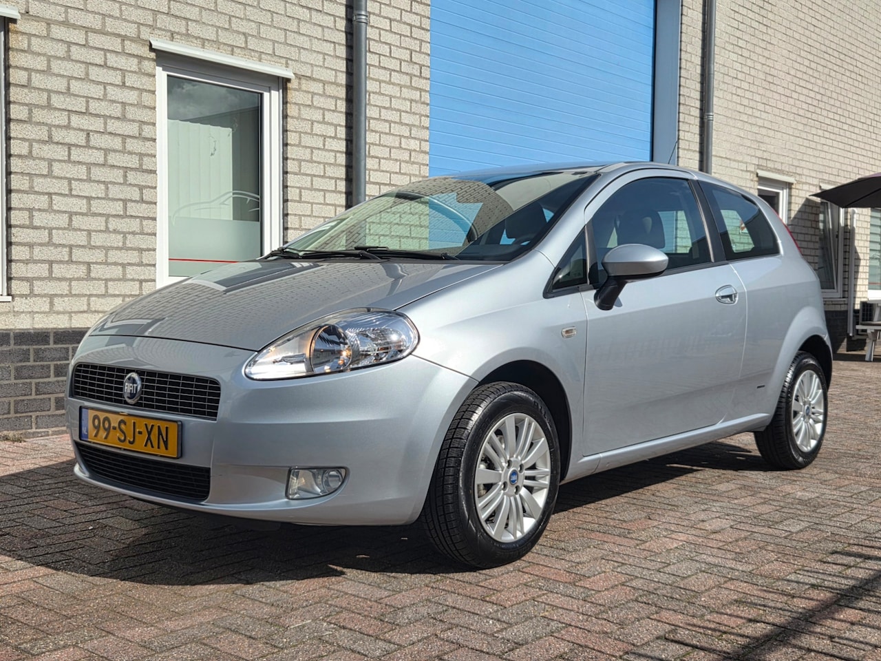 Fiat Grande Punto - 1.4 Edizione Prima Airco-Cruise 35.000km!! - AutoWereld.nl