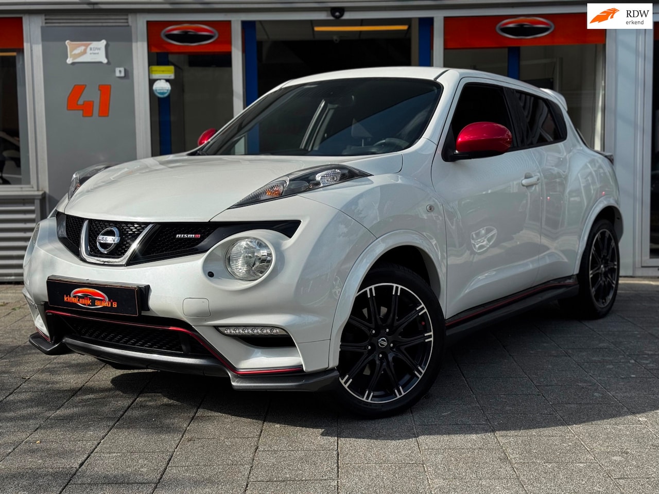 Nissan Juke - 1.6 Turbo NISMO 200PK Navi Camera Alcantara Dealer Onderhouden - AutoWereld.nl