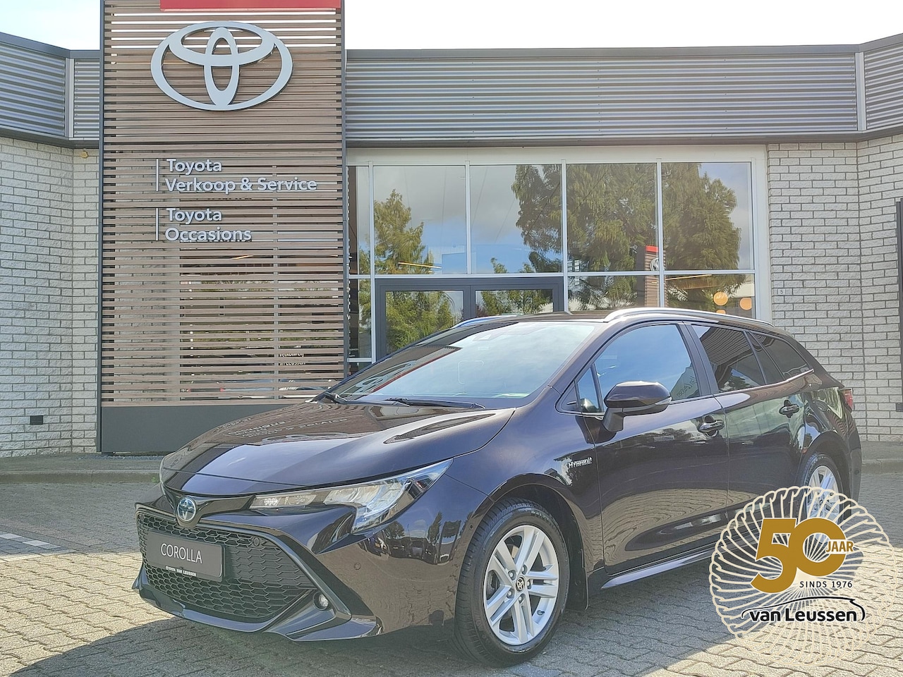 Toyota Corolla Touring Sports - 1.8 Hybrid Style TREKHAAK BLIND SPOT STOEL/STUURVERW PARK-SENSOREN HEAD-UP EL-ACHTERKLEP A - AutoWereld.nl