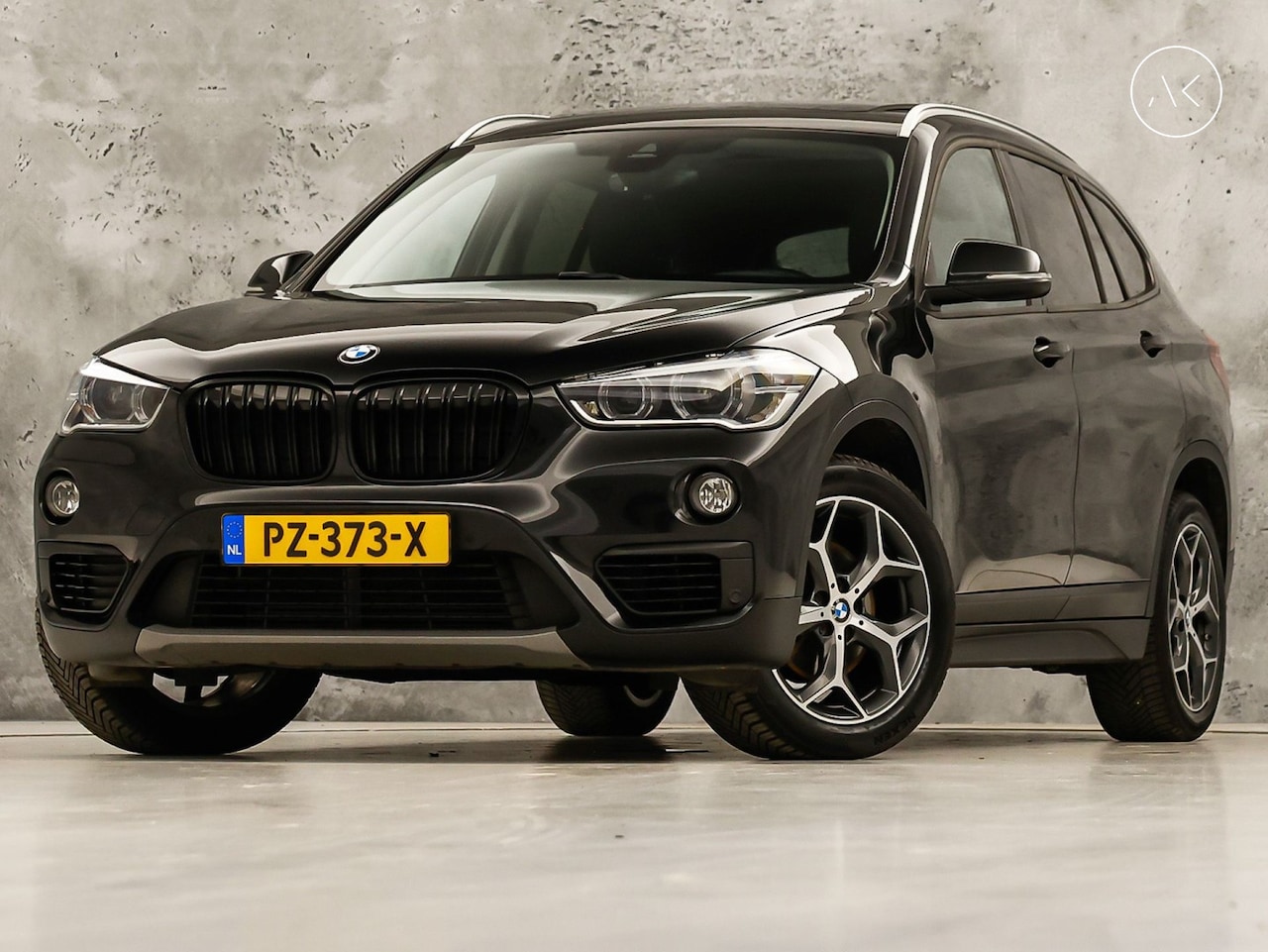 BMW X1 - sDrive18i Sport High Executive 140Pk Automaat (PANORAMADAK, GROOT NAVI, MEMORY SEAT, LEDER - AutoWereld.nl
