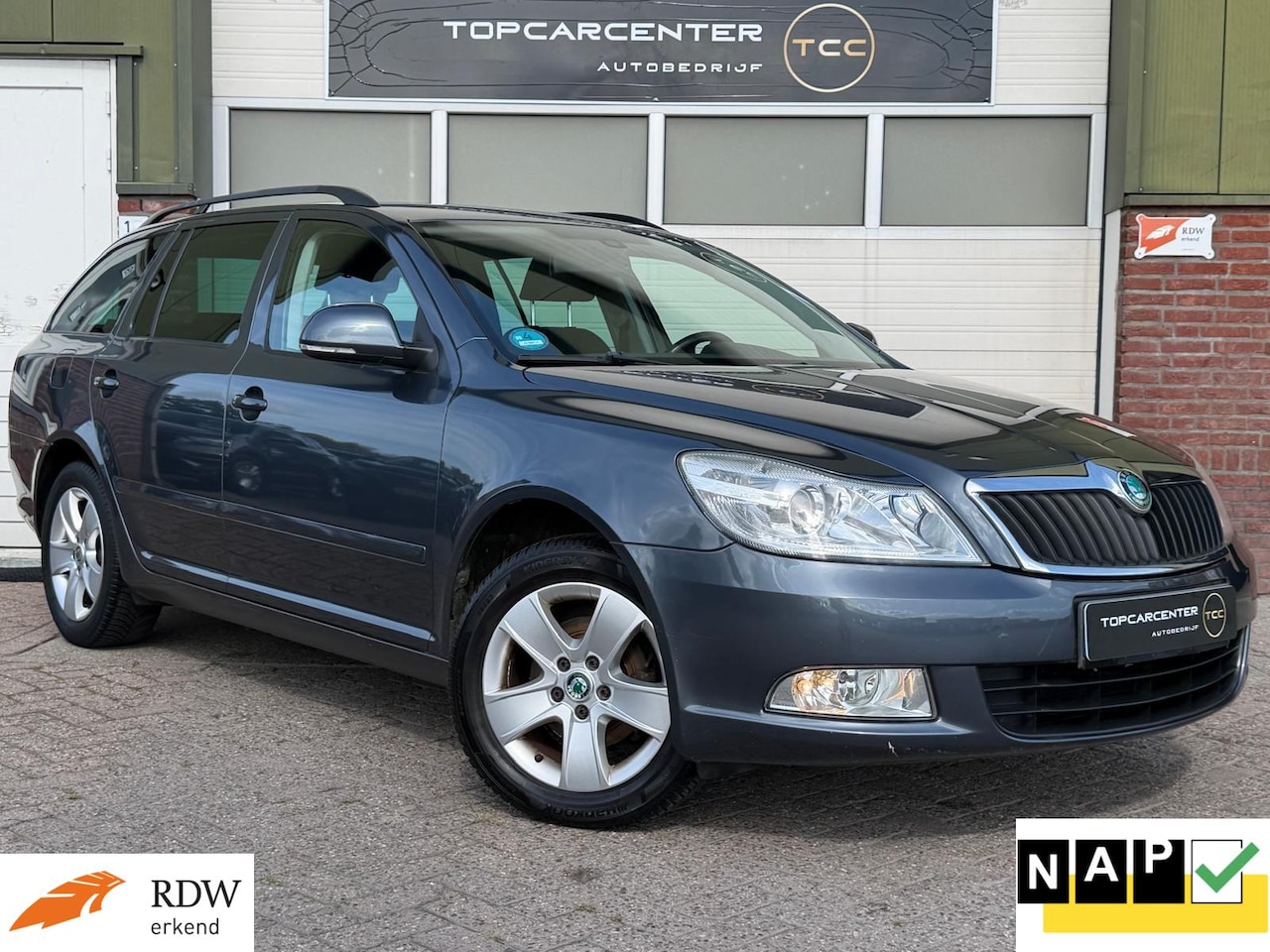 Skoda Octavia Combi - 1.4 TSI Ambit/AIRCO/PARKS/CRUISE/APK/NAP - AutoWereld.nl