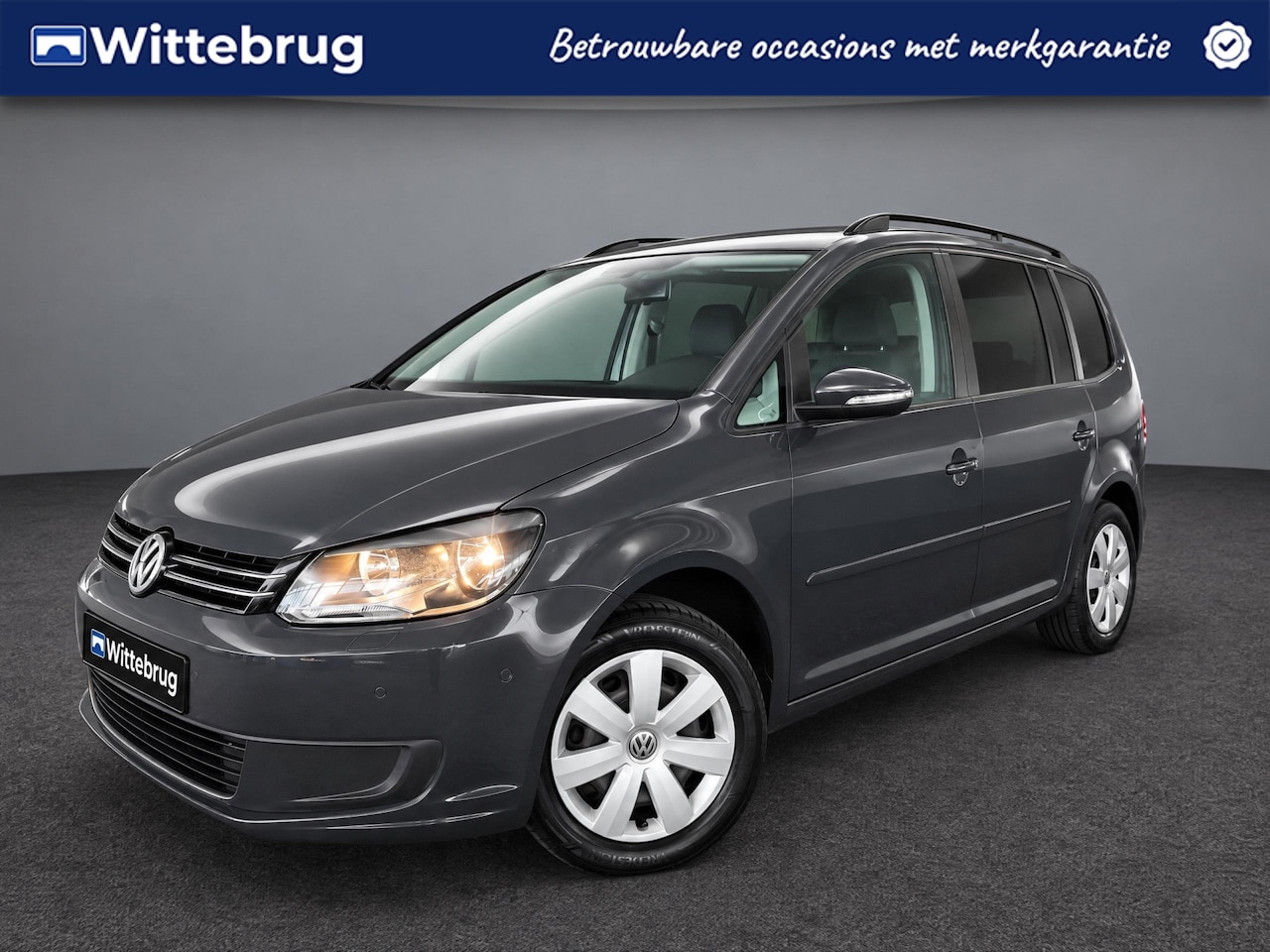 Volkswagen Touran - 1.2 TSI Highline BlueMotion 5 Persoons / Cruise controle / Parkeersensoren V+A / Stoelverw - AutoWereld.nl