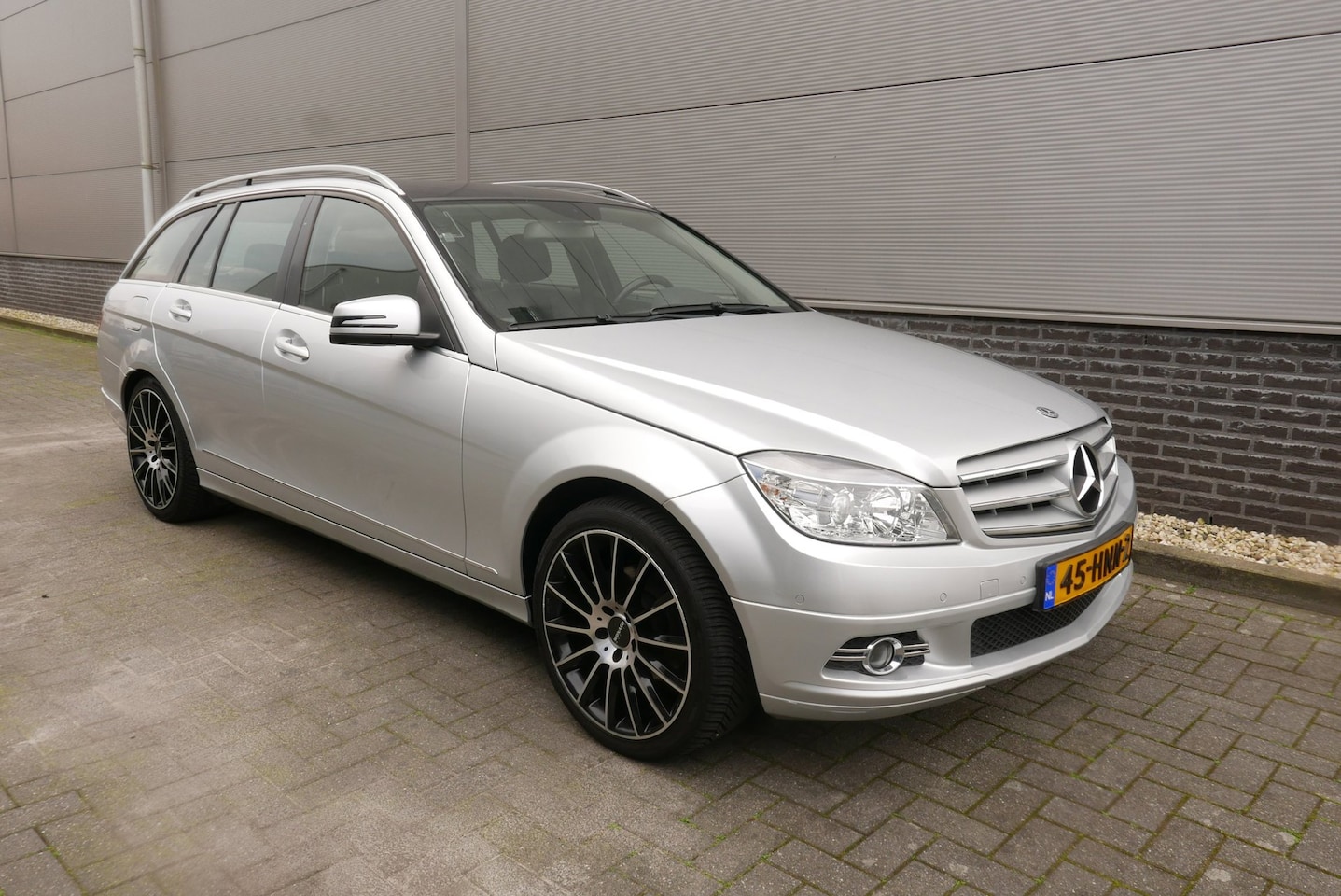 Mercedes-Benz C-klasse Estate - 180 K 156 PK Business Class NAVI,LEER,CLIMA,TREKHAAK. - AutoWereld.nl