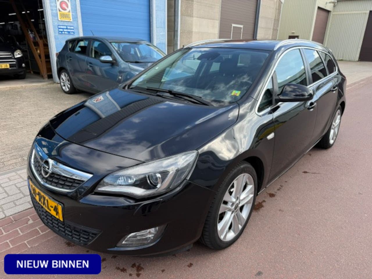 Opel Astra Sports Tourer - 1.4 Turbo Sport Automaat 1e eigenaar LEDER Schuifdak Zeer luxe uitvoering met alle boekjes - AutoWereld.nl