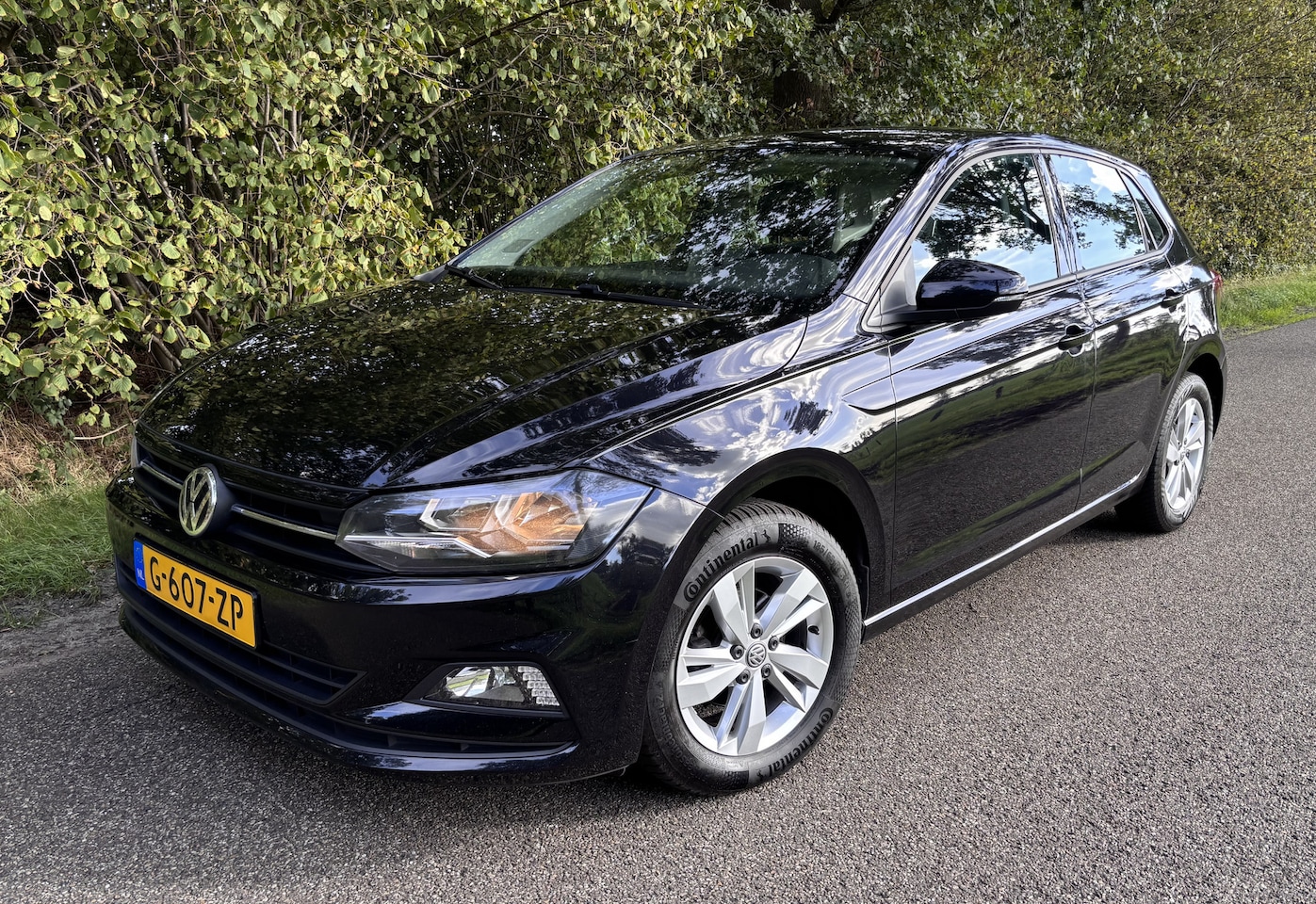 Volkswagen Polo - 1.0i Comfortline 5-drs Navi, Cruise - AutoWereld.nl