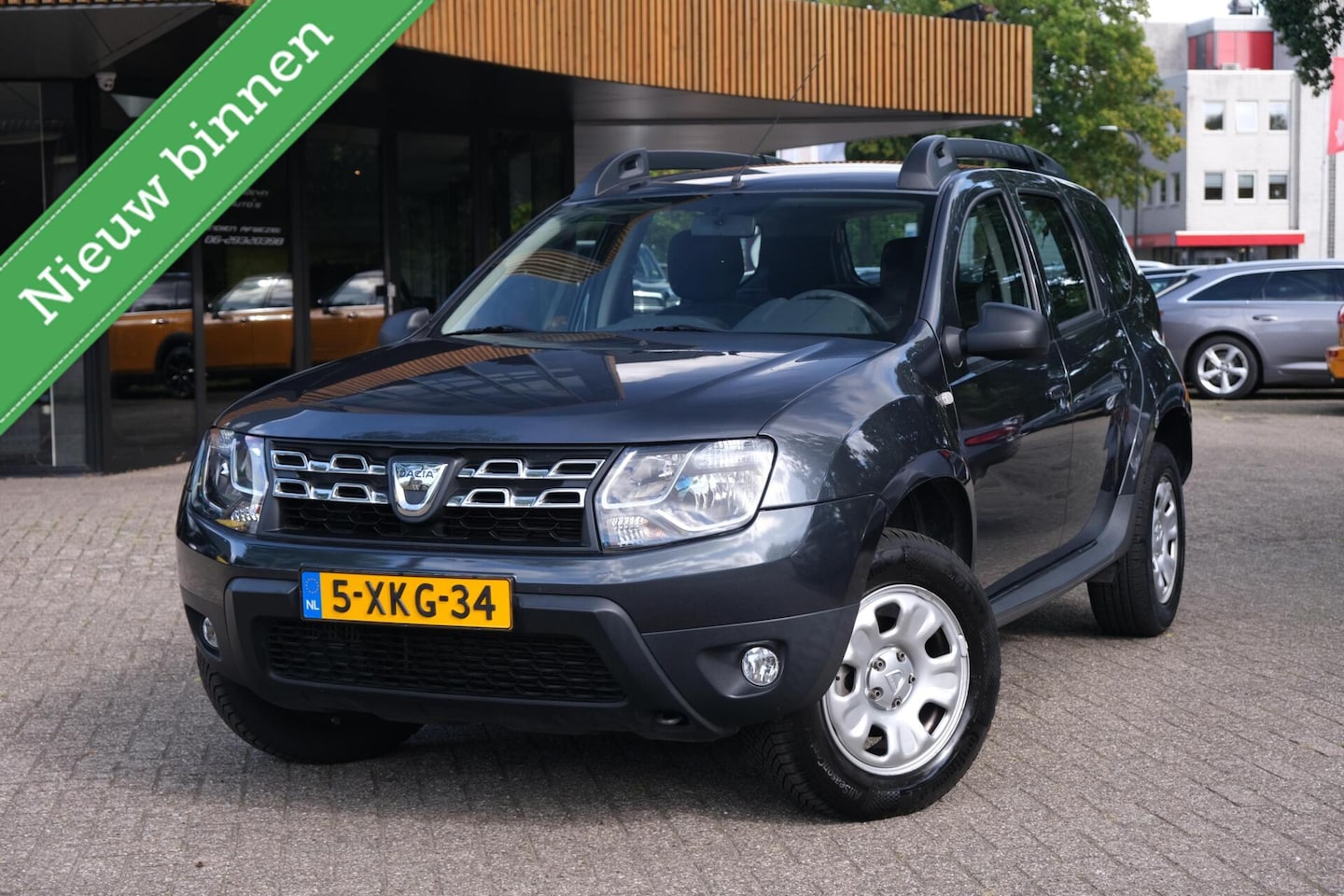 Dacia Duster - 1.2 TCe 4x2 Lauréate|Rijklaar!|Trekhaak|Cruise|Airco|Bluetooth - AutoWereld.nl
