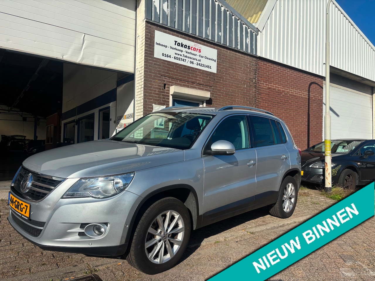 Volkswagen Tiguan - 2.0 TSI Sport&Style 4Motion AUTOMAAT &APK&NAP - AutoWereld.nl